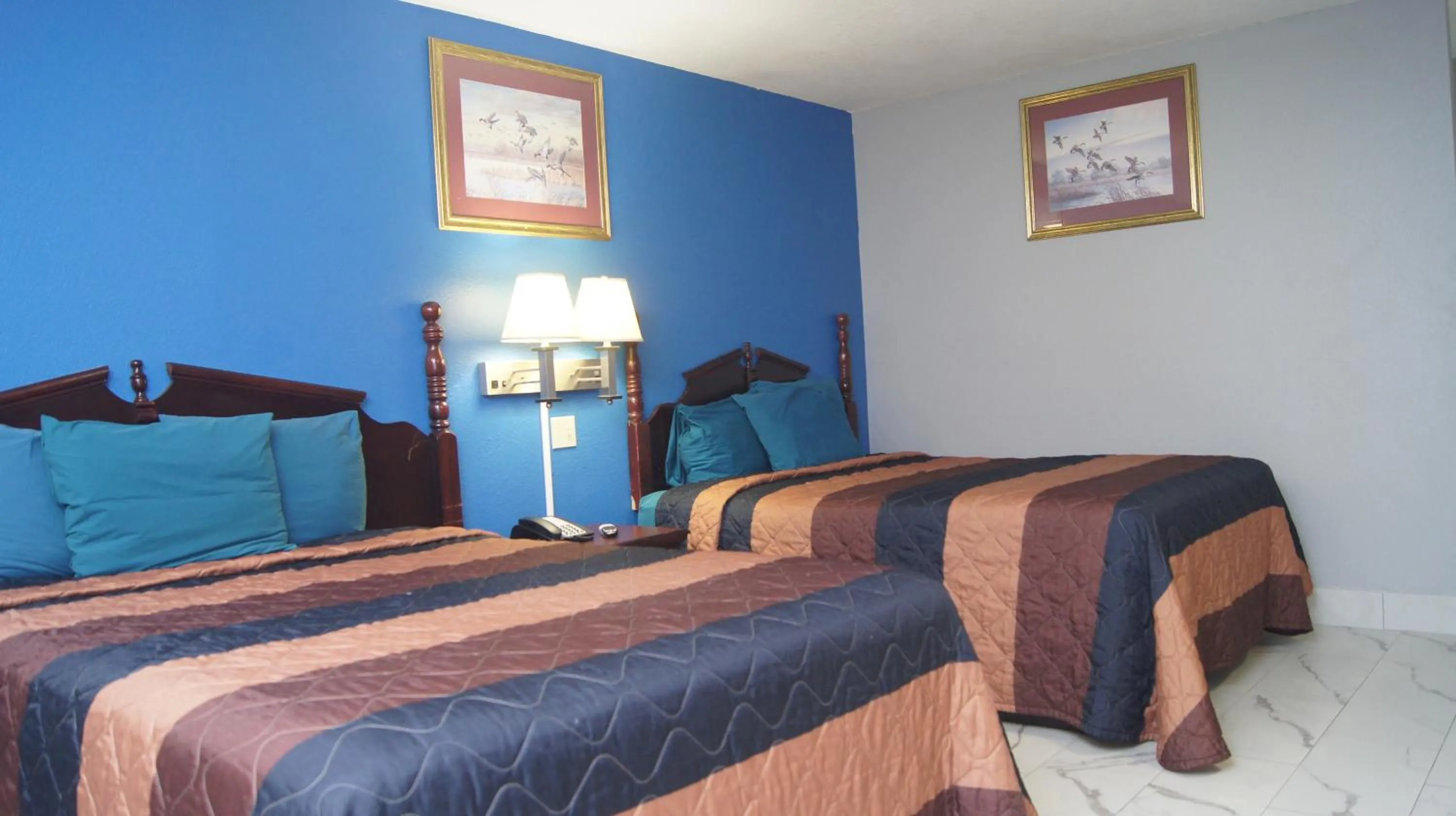 Bedroom in Holiday Lodge & Suites