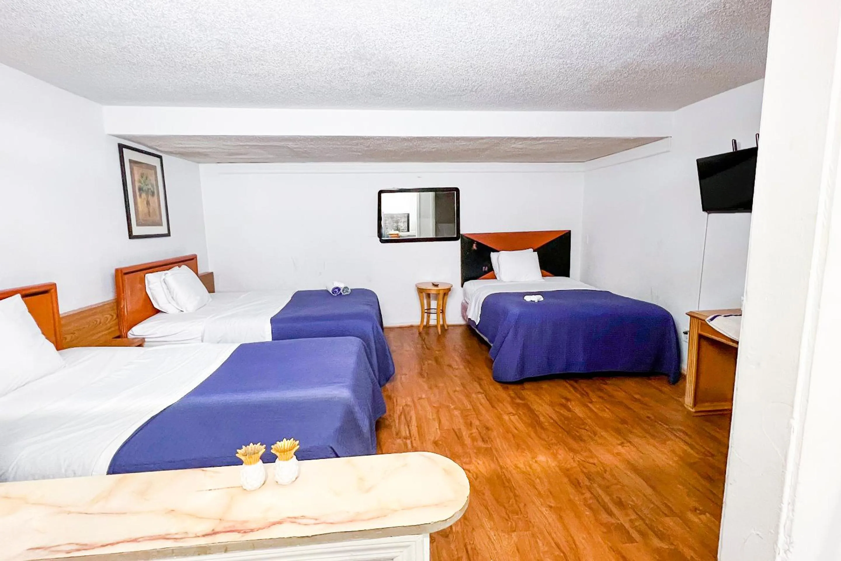 Bedroom in Crepe Myrtle by OYO