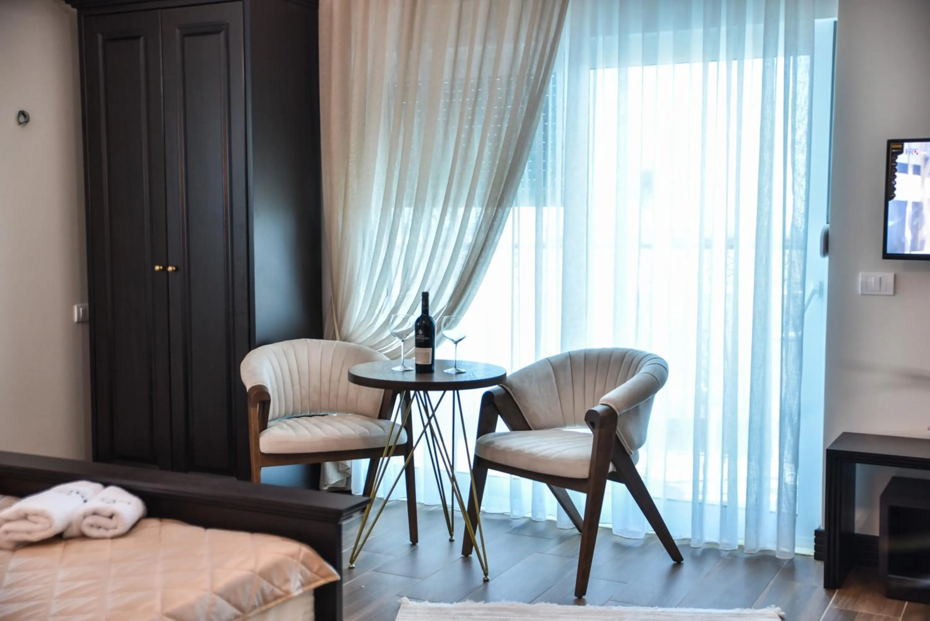 Seating area, Bed in Padam Hotel & SPA