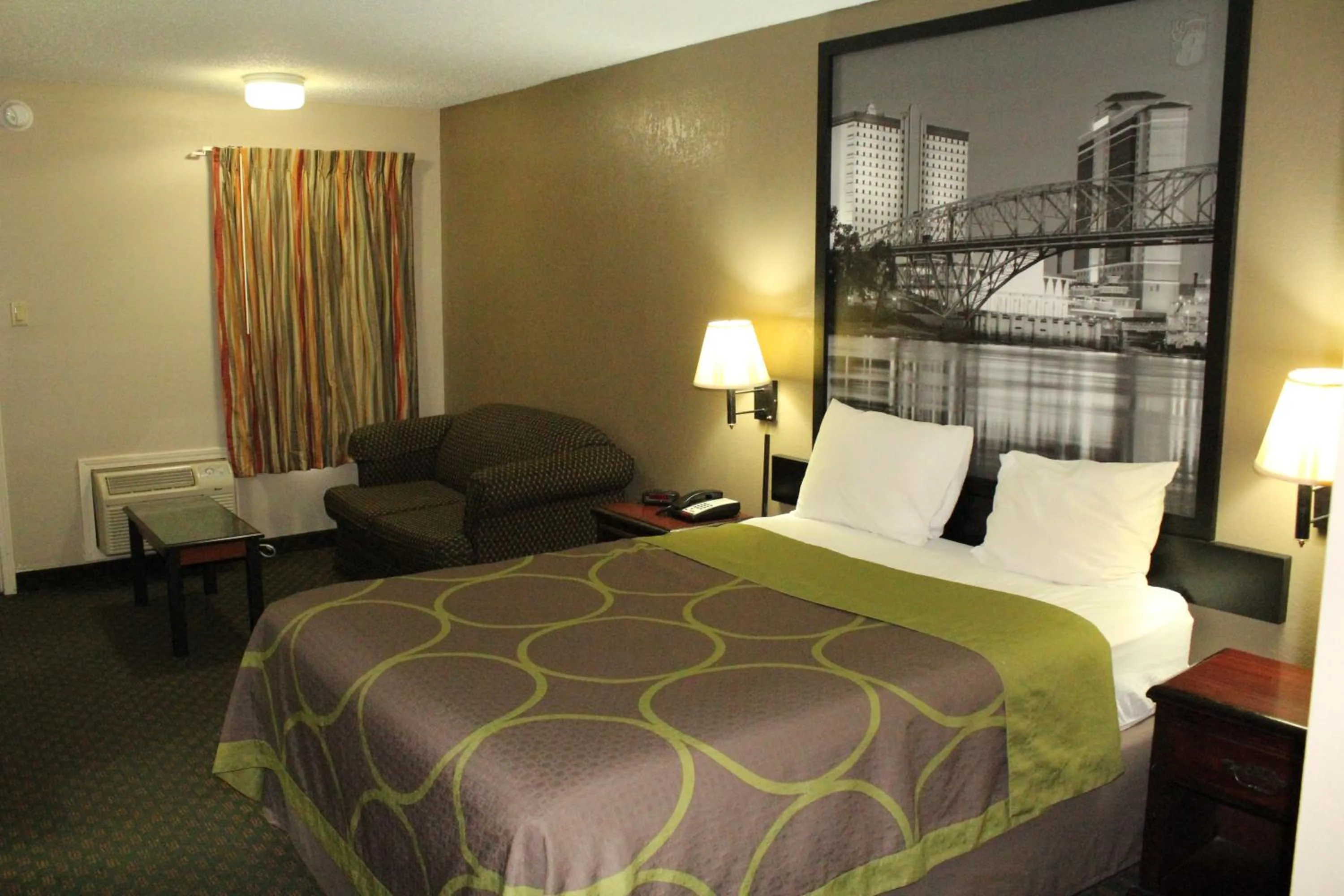 Seating area, Bed in Super 8 by Wyndham Bossier City/Shreveport Area