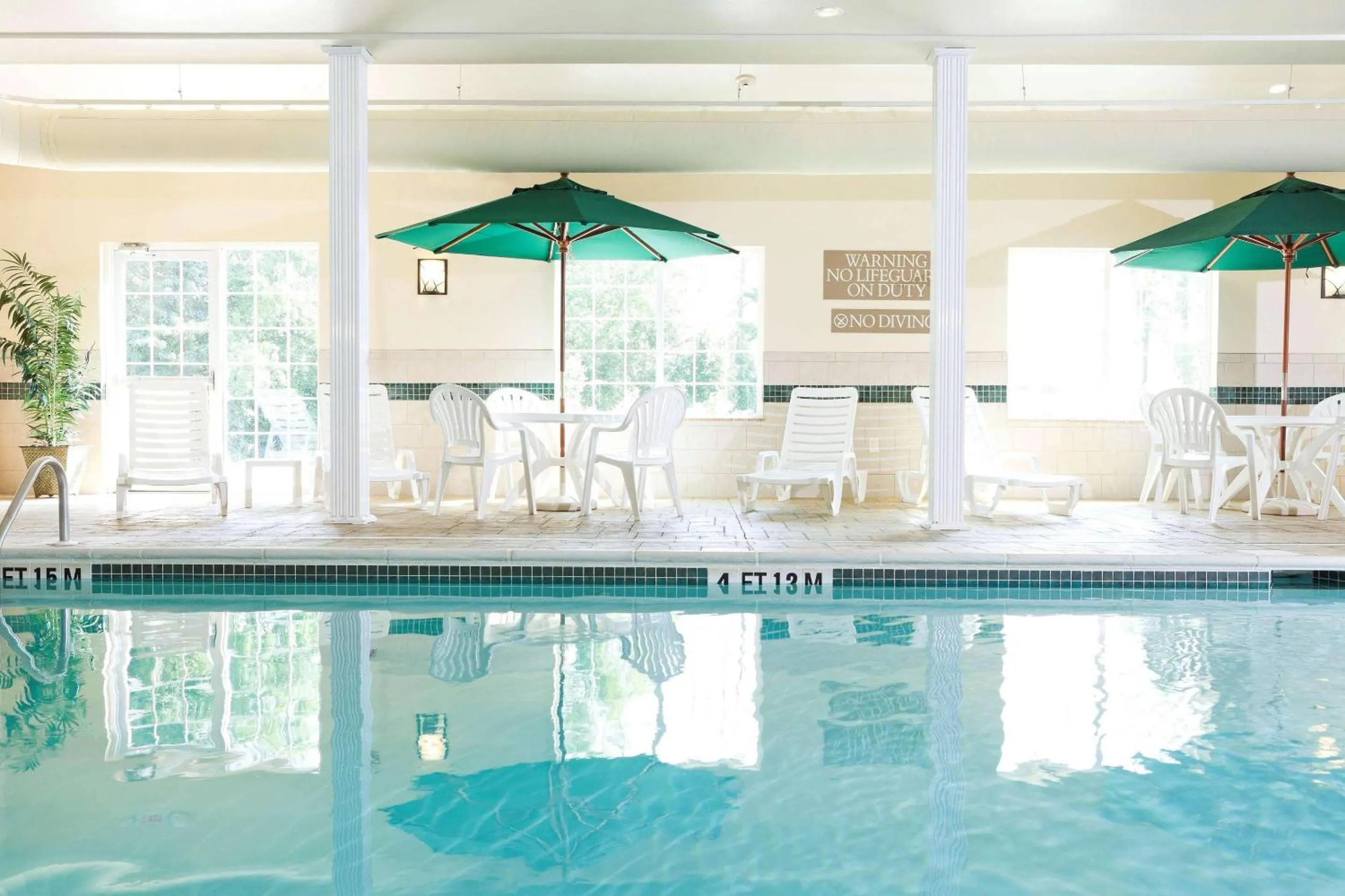 Swimming pool in Country Inn & Suites by Radisson, Rocky Mount, NC