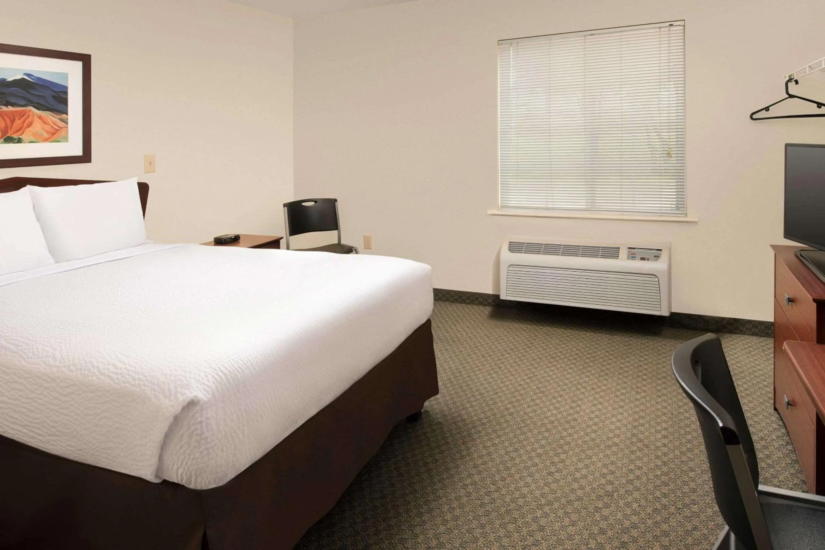 Photo of the whole room, Bed in WoodSpring Suites Waco near University