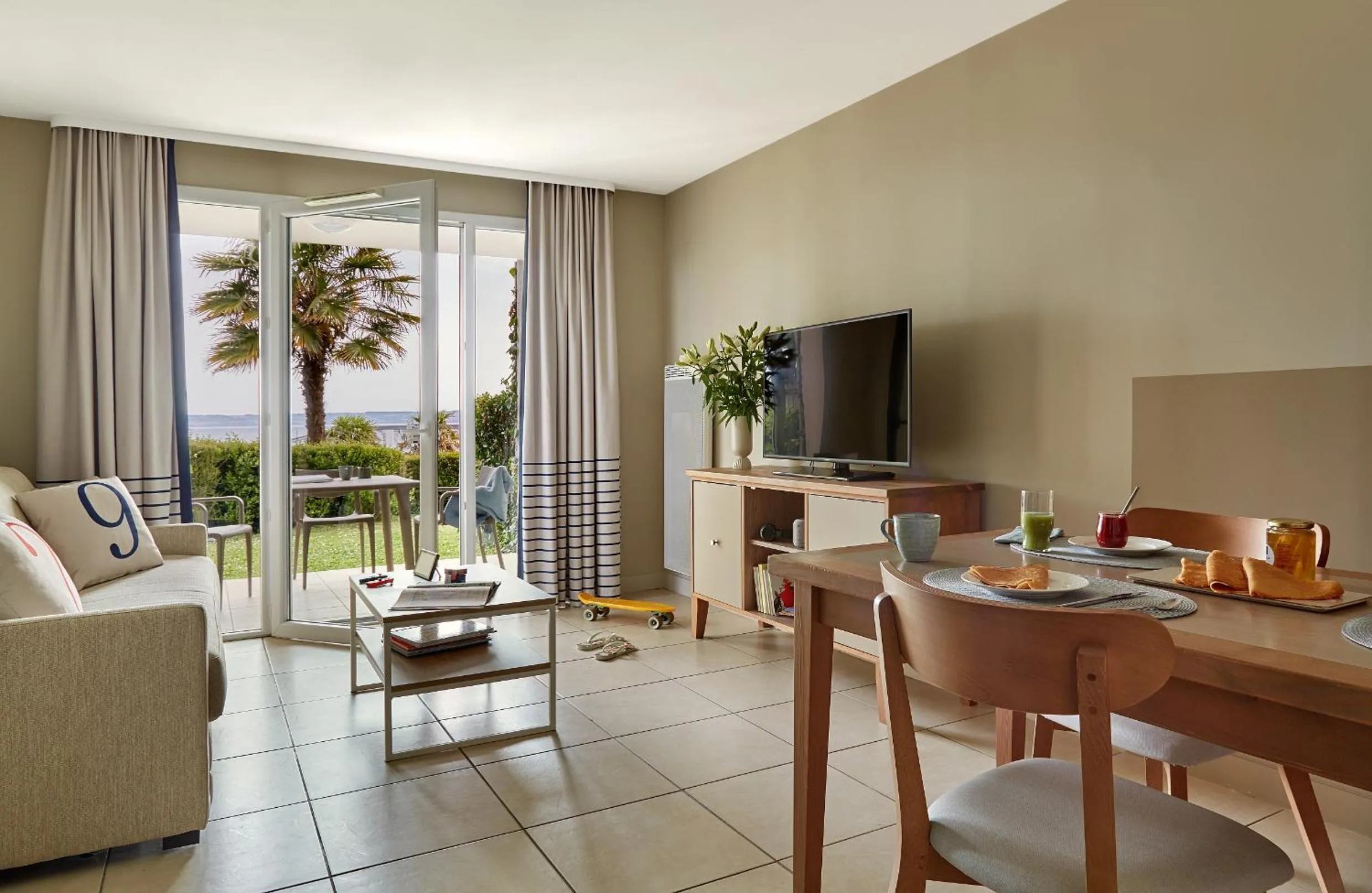 Communal lounge/ TV room in Résidence Pierre & Vacances Premium Le Coteau et la Mer