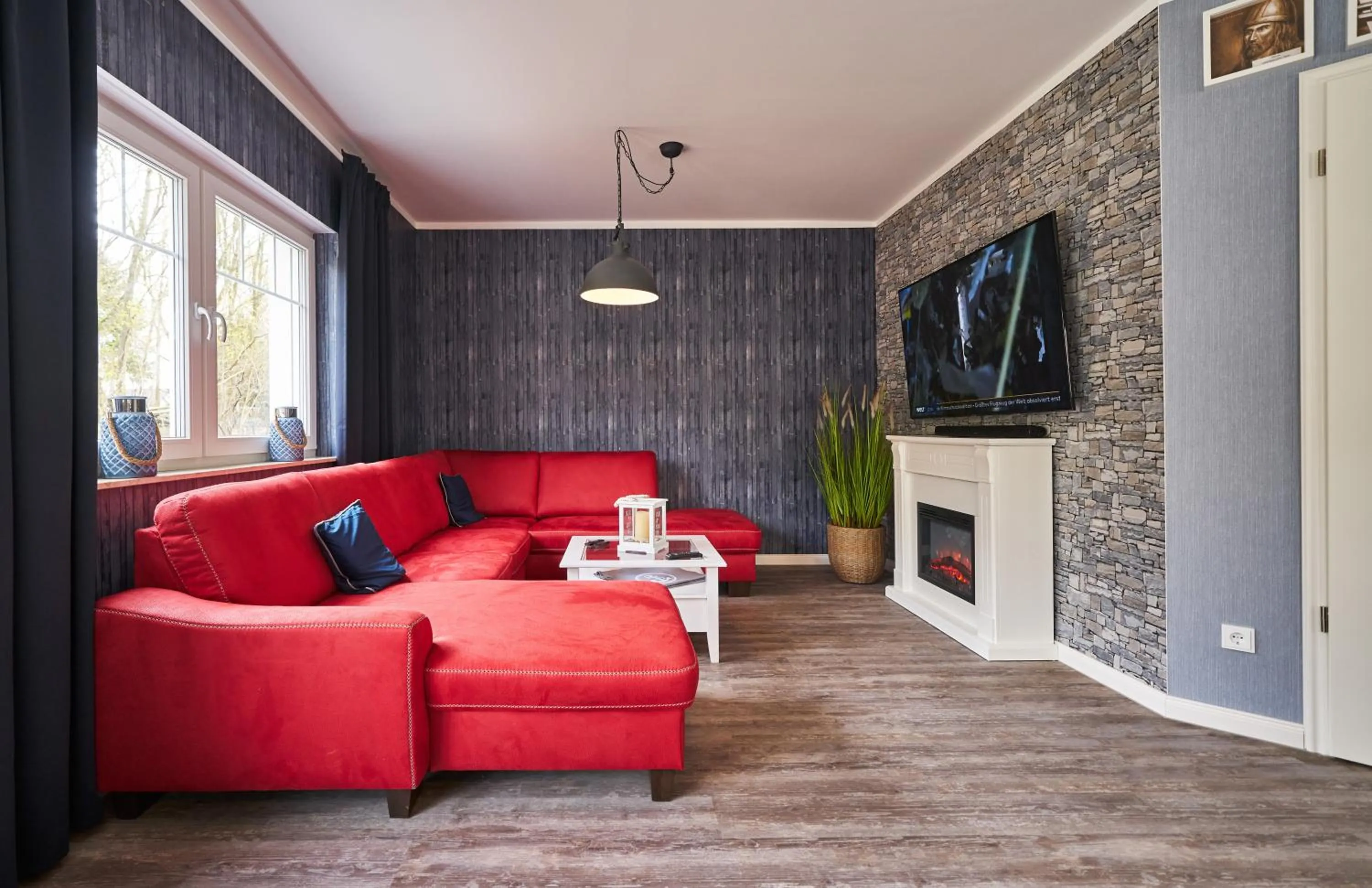 Communal lounge/ TV room in Freester Kapitänshäuser