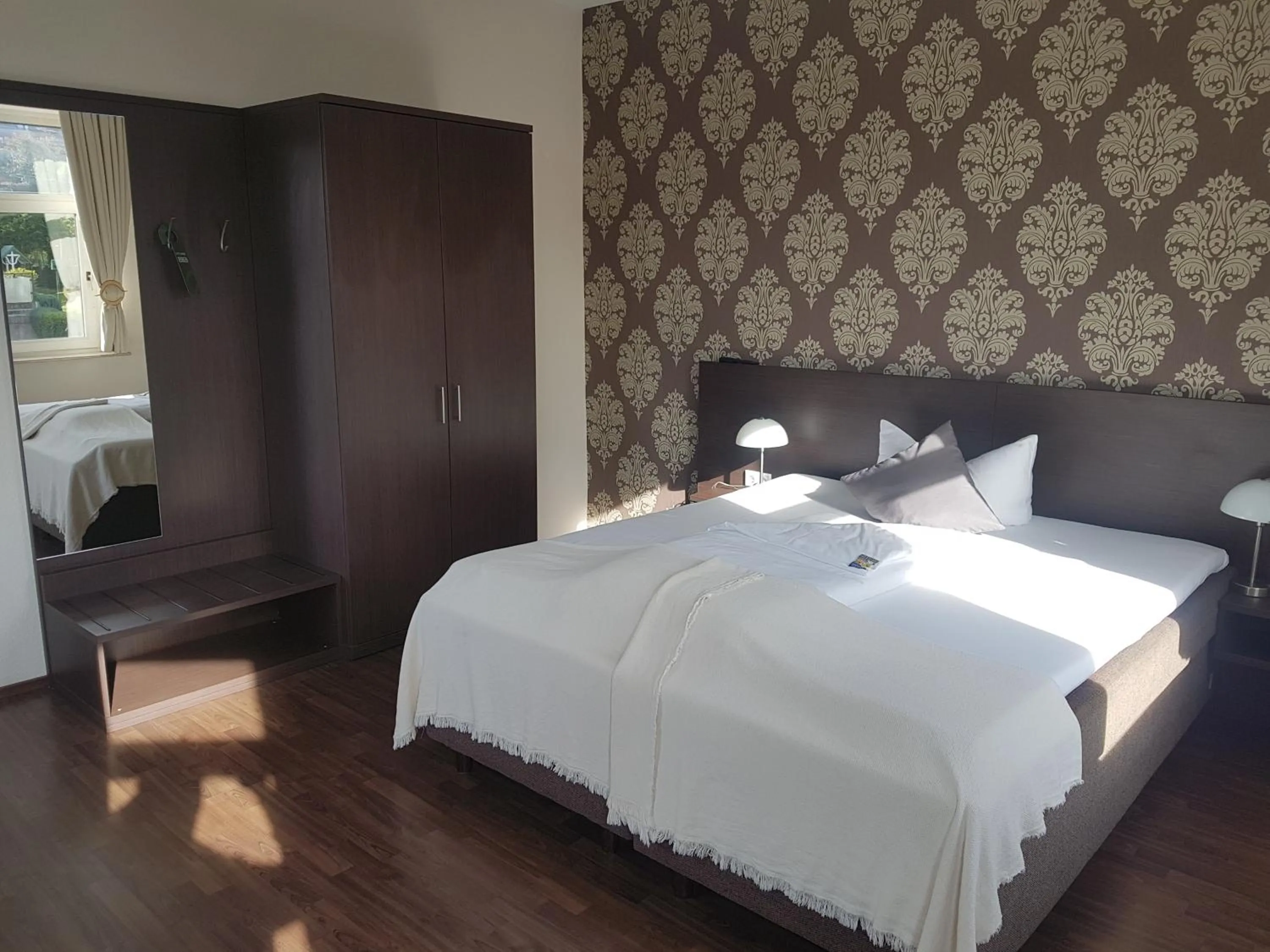 Bed in Weltmann`s Hotel & Restaurant