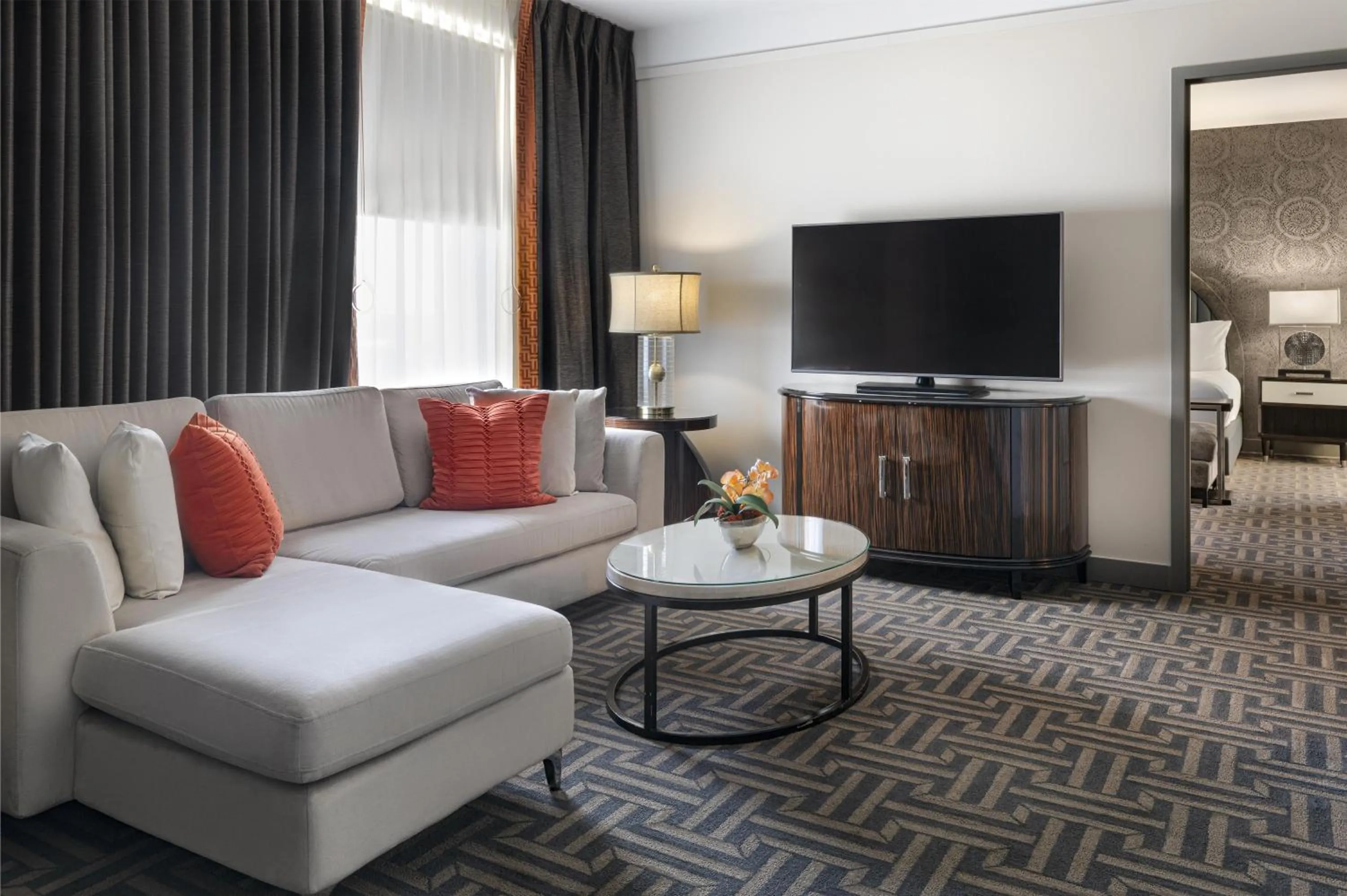 Living room in Colcord Hotel Oklahoma City, Curio Collection by Hilton