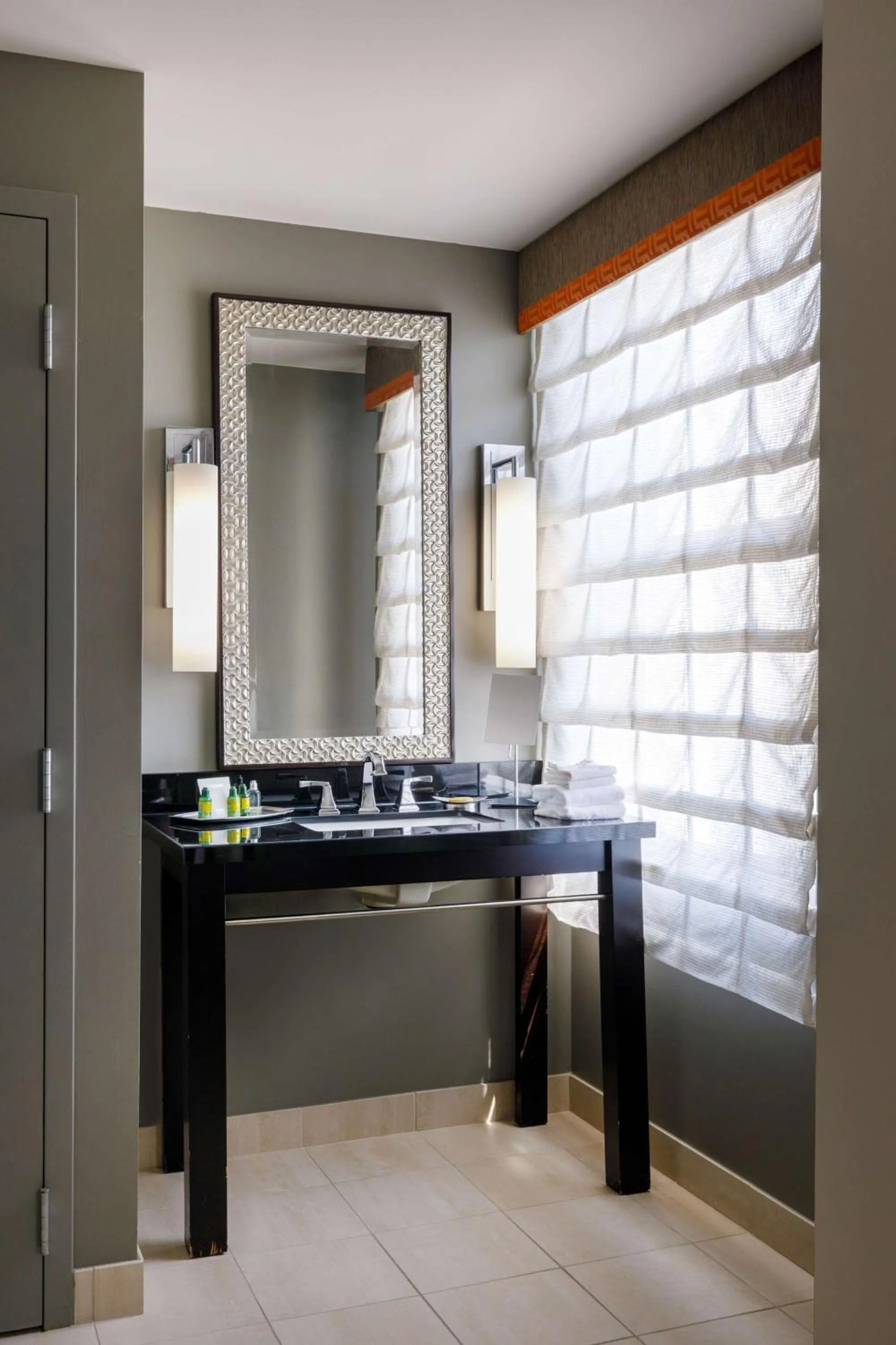 Bathroom in Colcord Hotel Oklahoma City, Curio Collection by Hilton