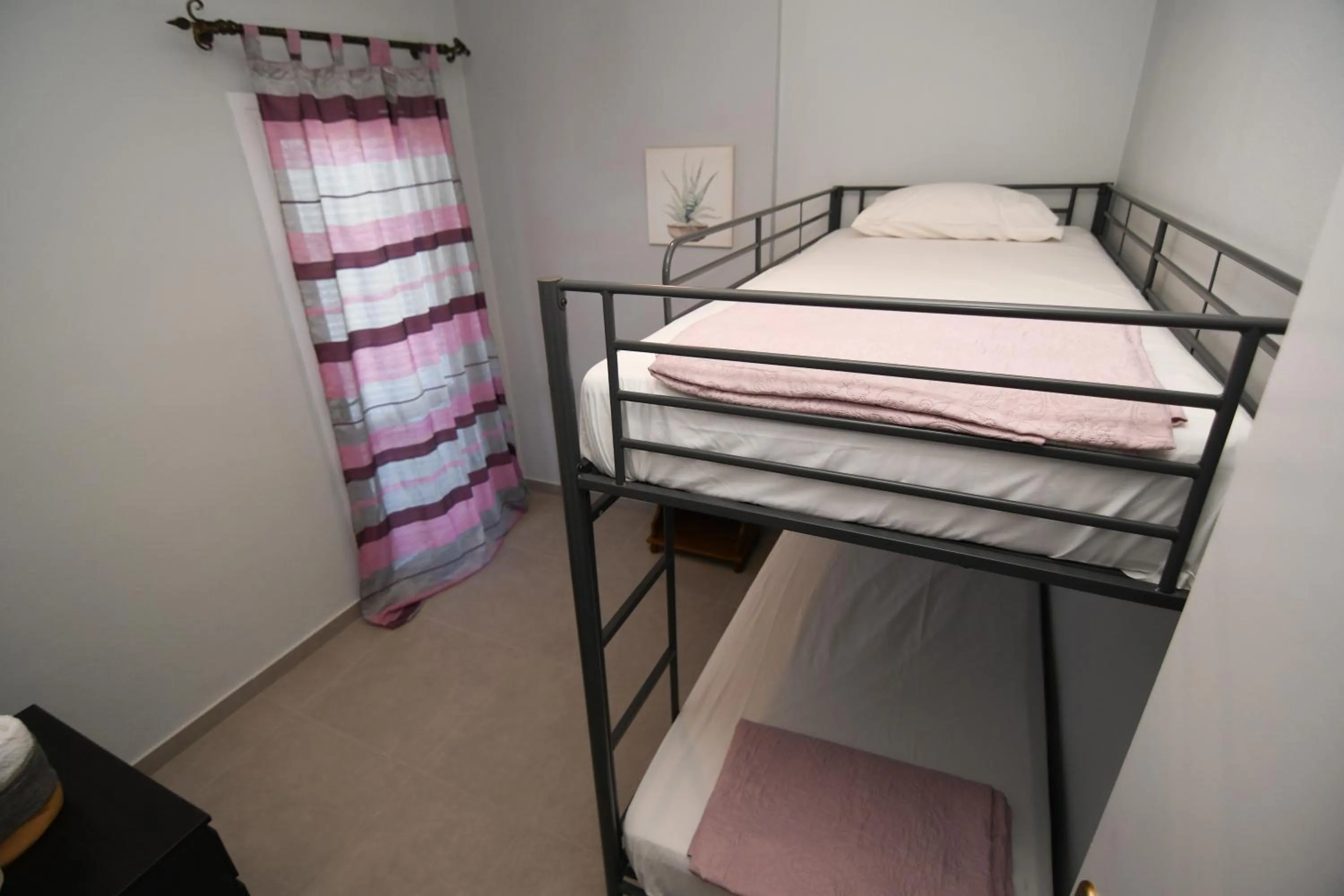 Bed in Rose Garden Apartments