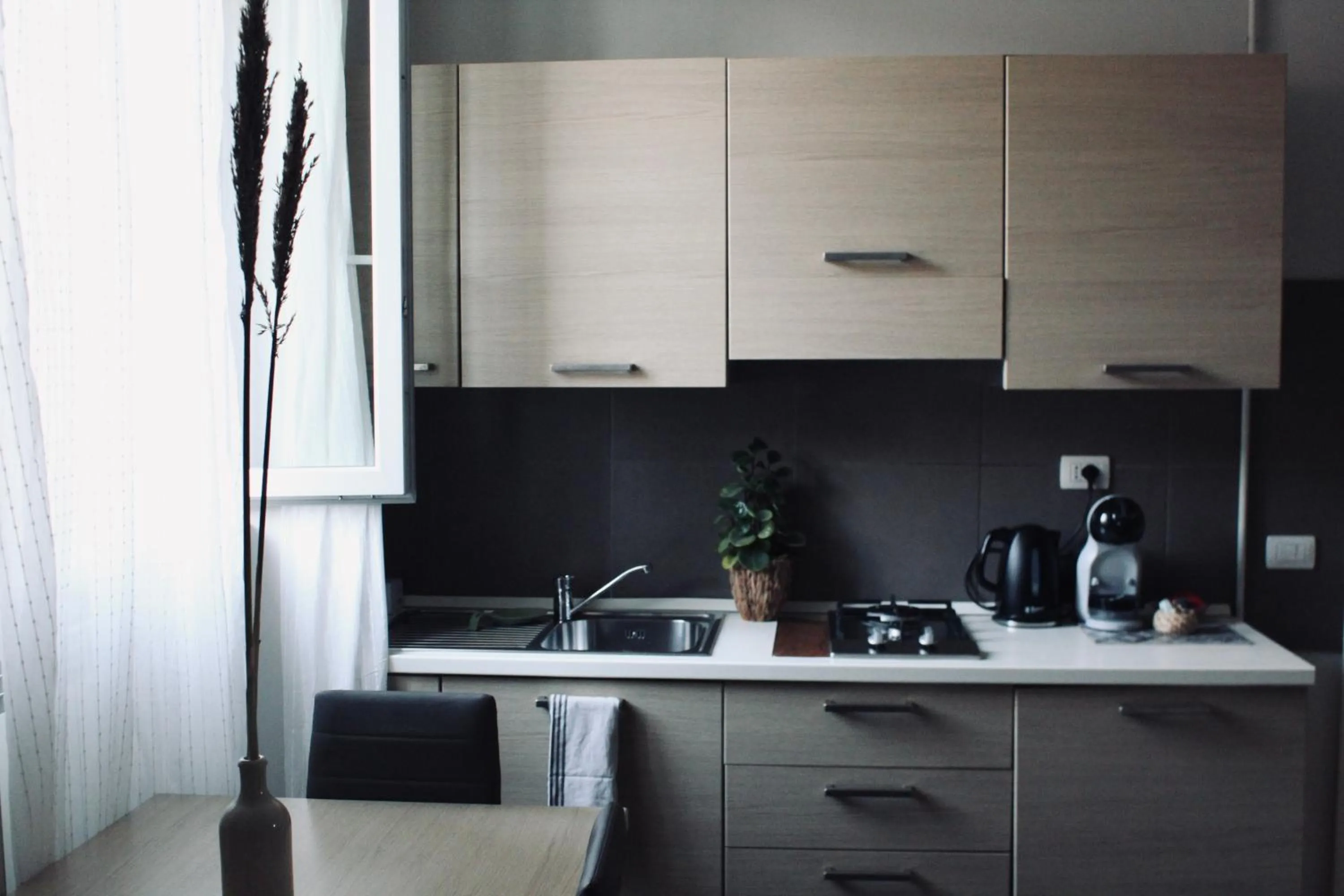 Kitchen or kitchenette in L'Angelica Holiday Home