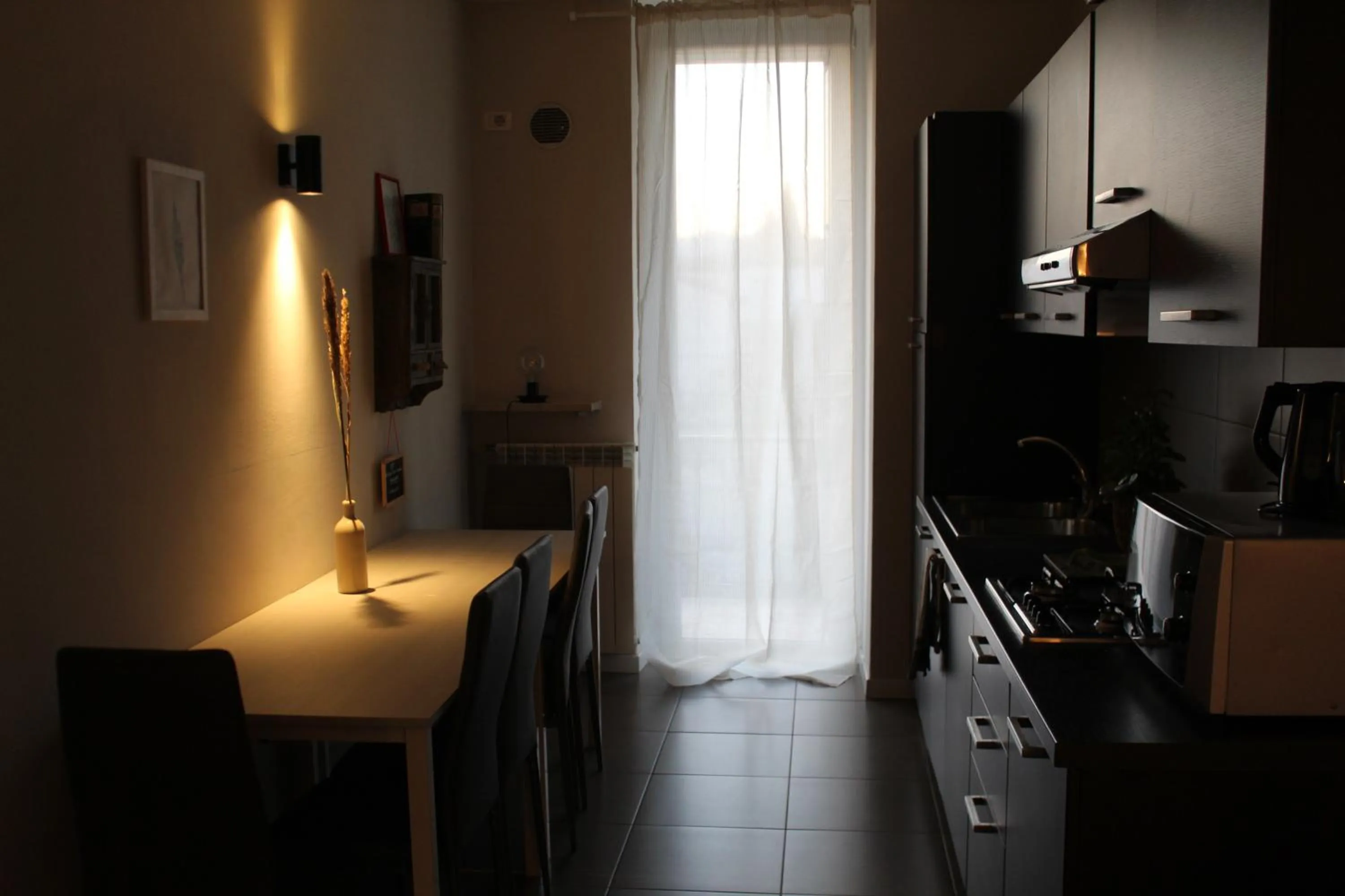 Kitchen or kitchenette in L'Angelica Holiday Home