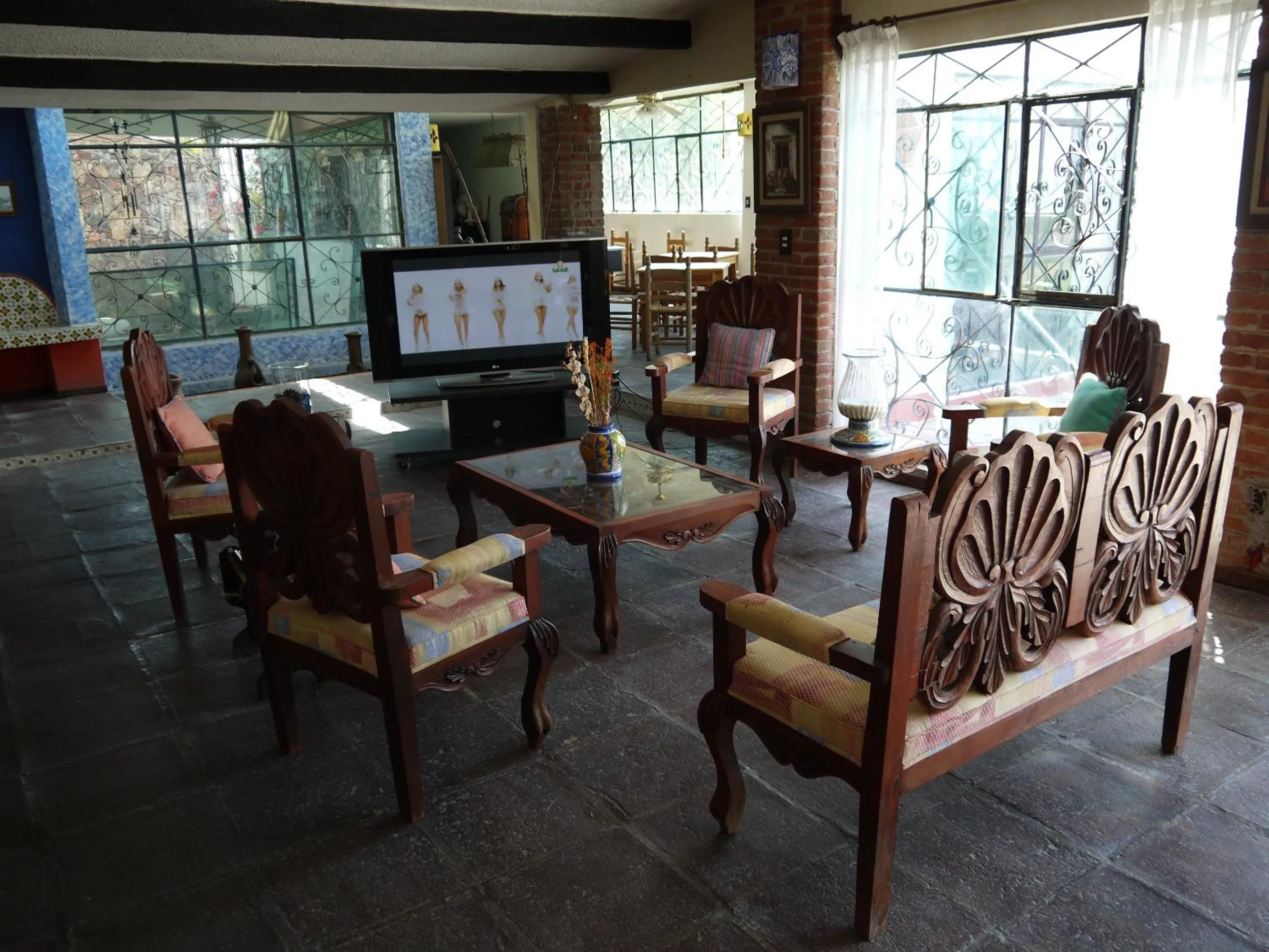Communal lounge/ TV room in Hotel No Que No
