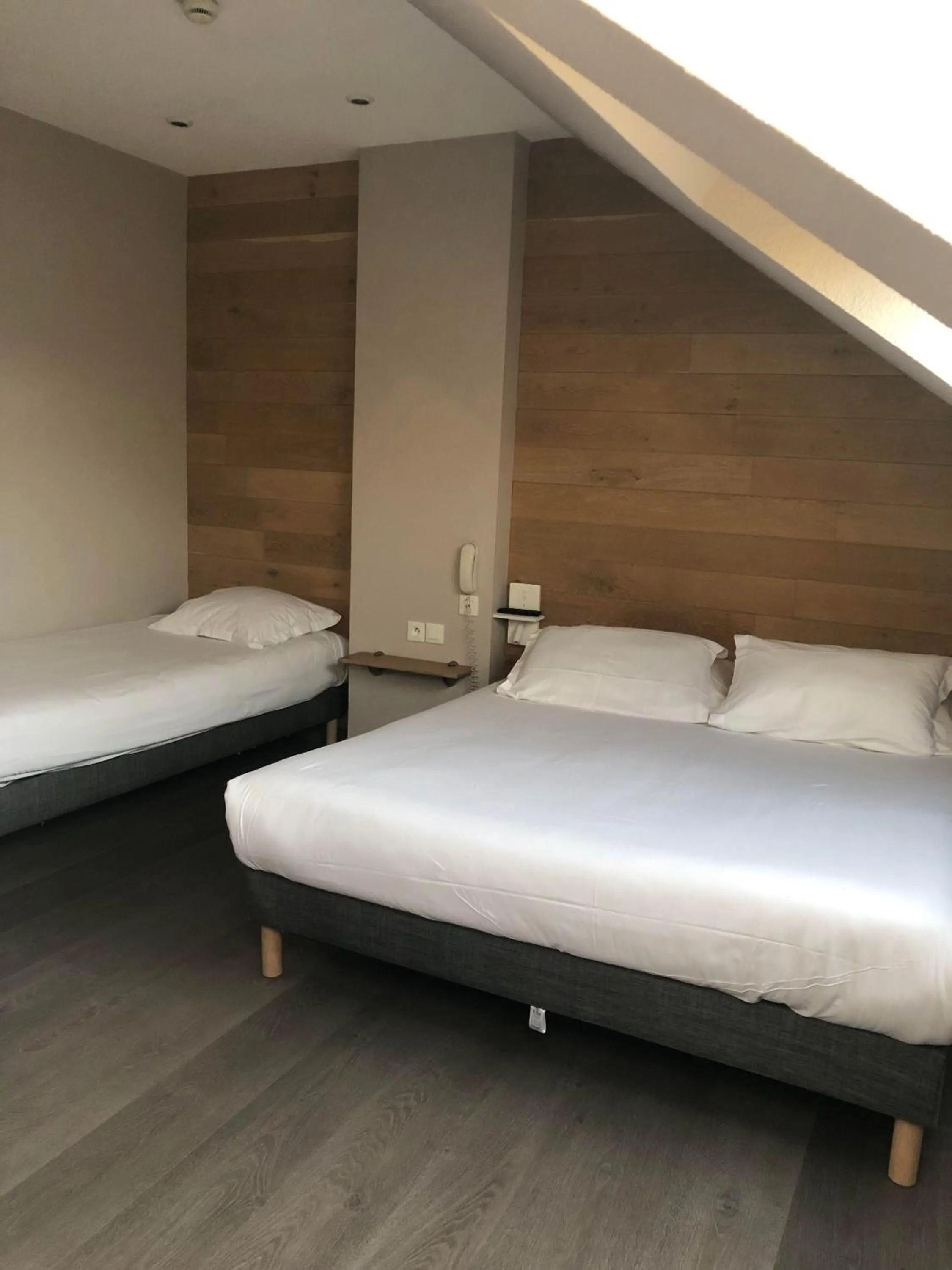 Photo of the whole room, Bed in Logis Hôtel-Restaurant Les Loges