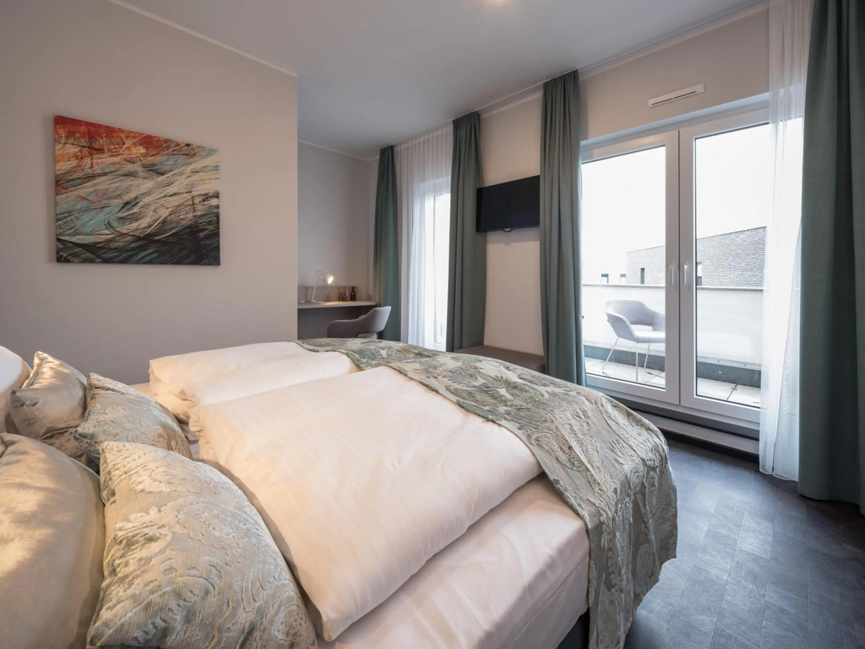 Bed in RS-HOTEL - smart & modern Hotel Apartments