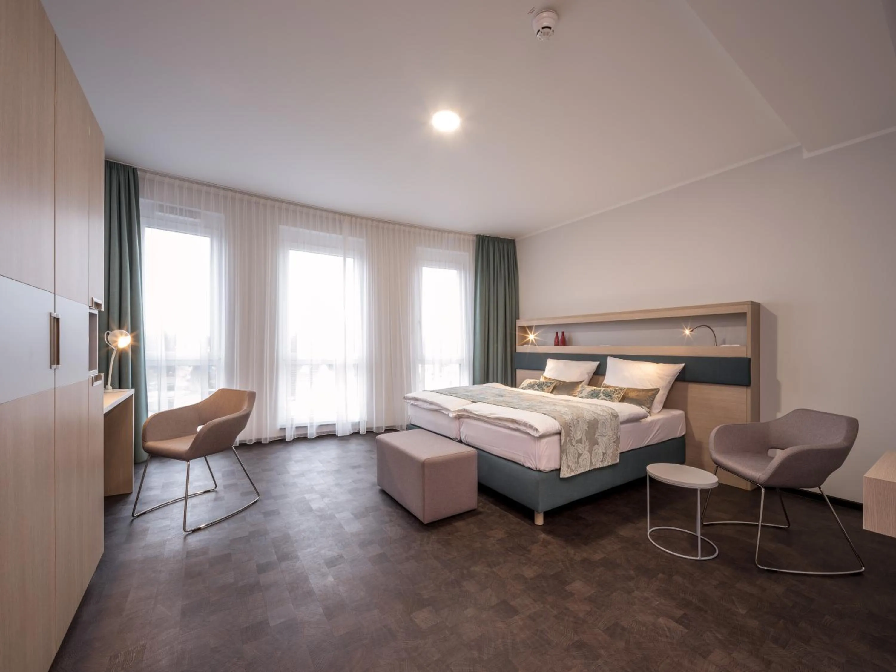 Bed in RS-HOTEL - smart & modern Hotel Apartments