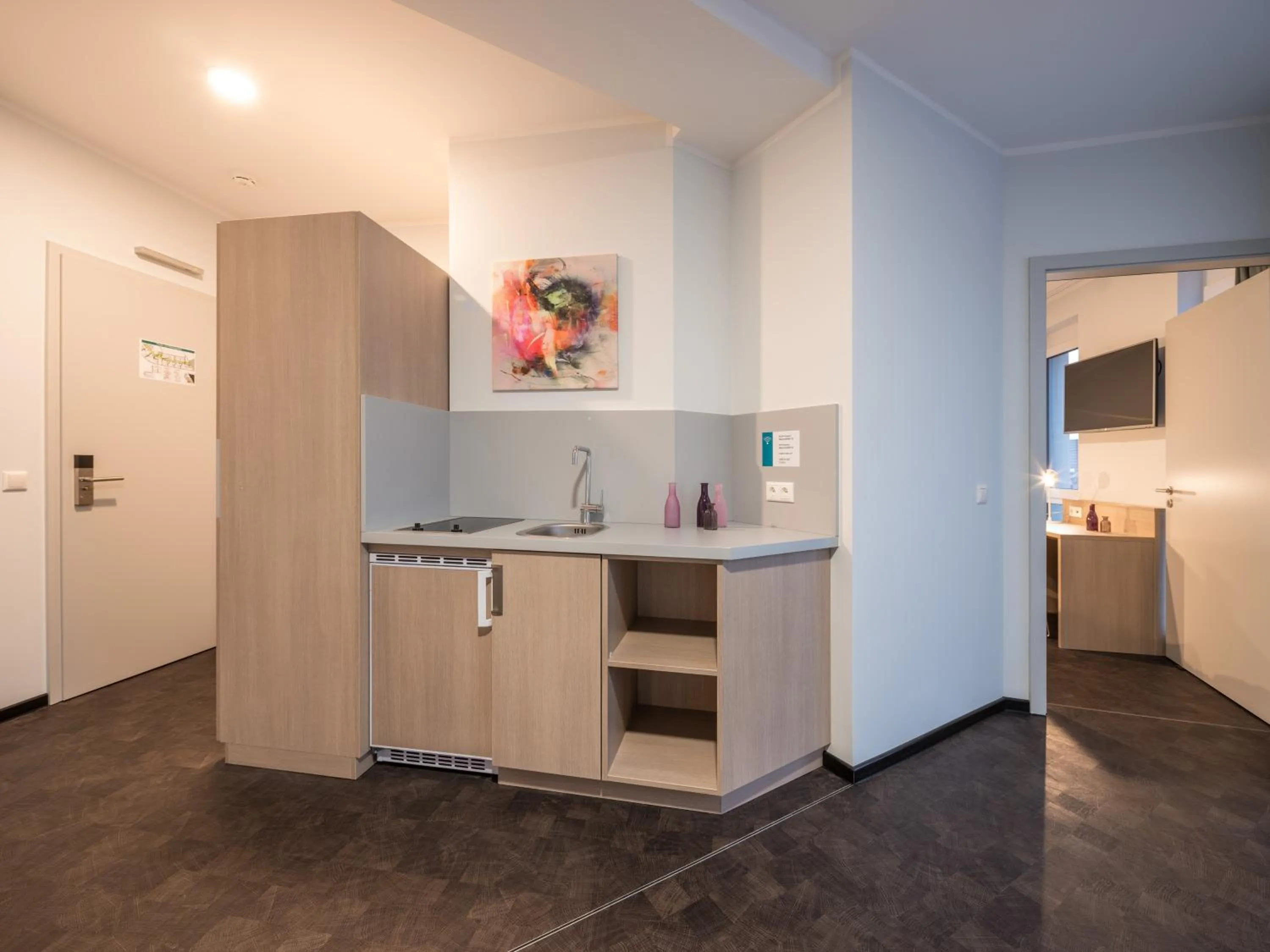 Kitchen or kitchenette in RS-HOTEL - smart & modern Hotel Apartments