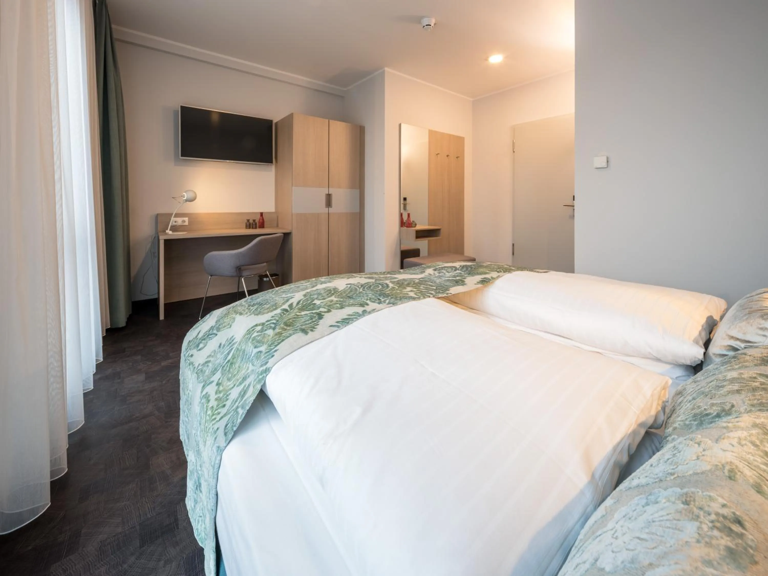 Bed in RS-HOTEL - smart & modern Hotel Apartments