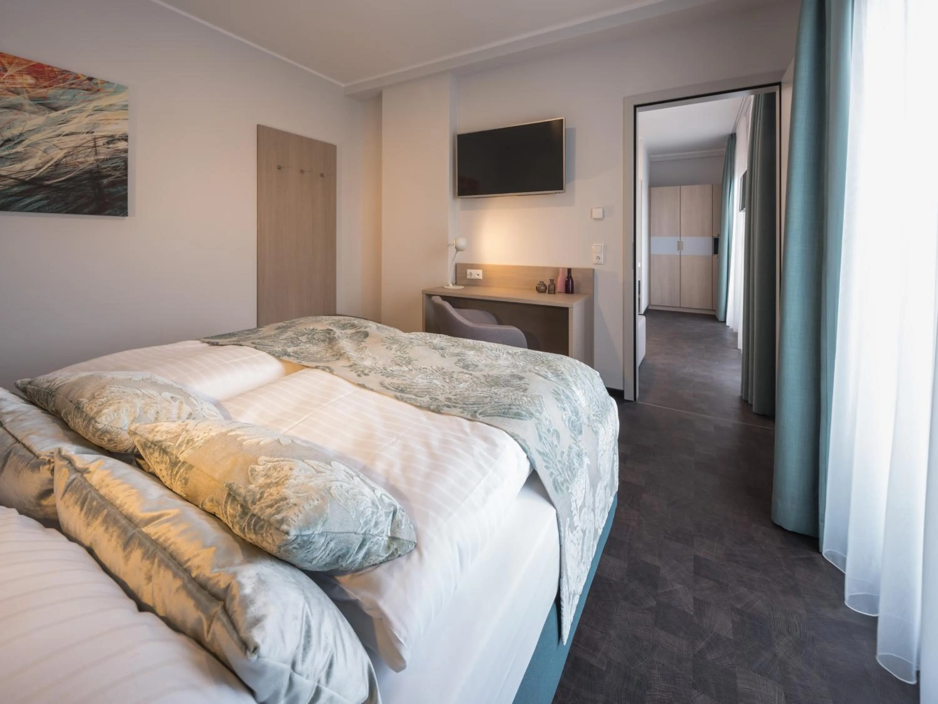 Bed in RS-HOTEL - smart & modern Hotel Apartments