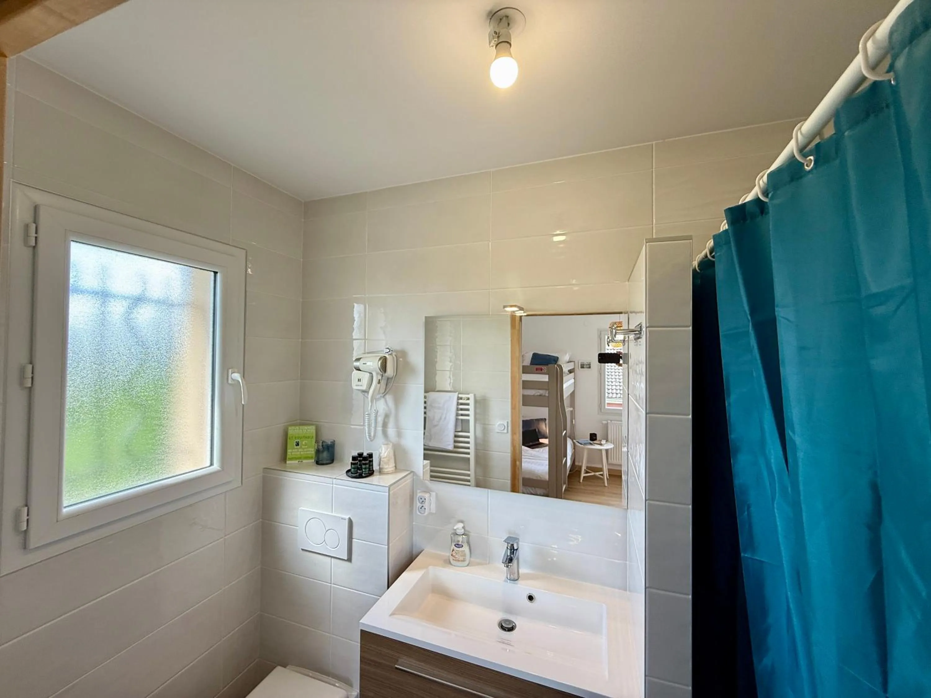 Bathroom in Chambres d'hôtes Grange Debout