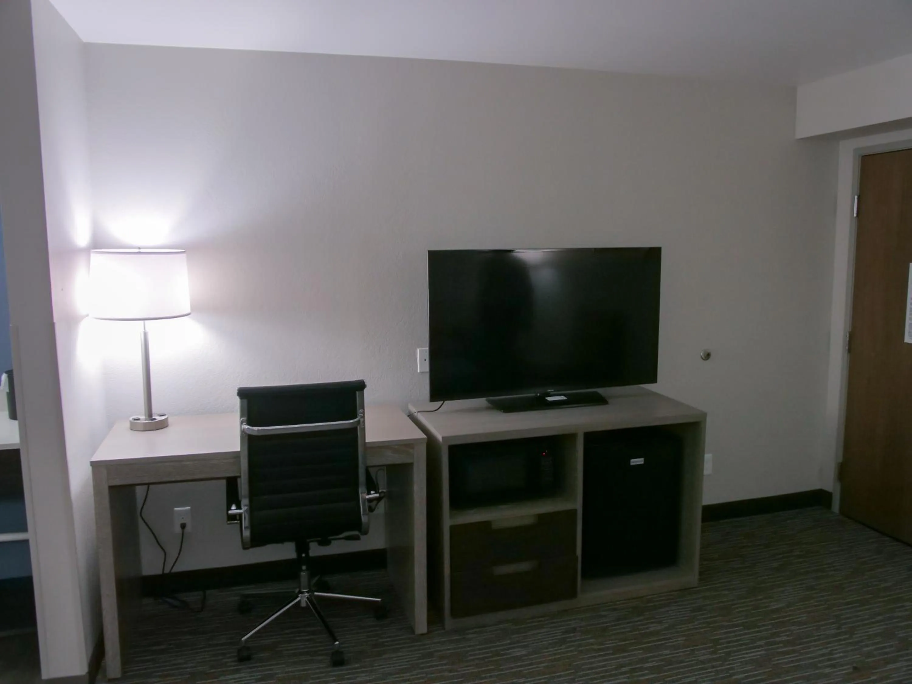 Living room in Wingate by Wyndham Louisville Airport Expo Center