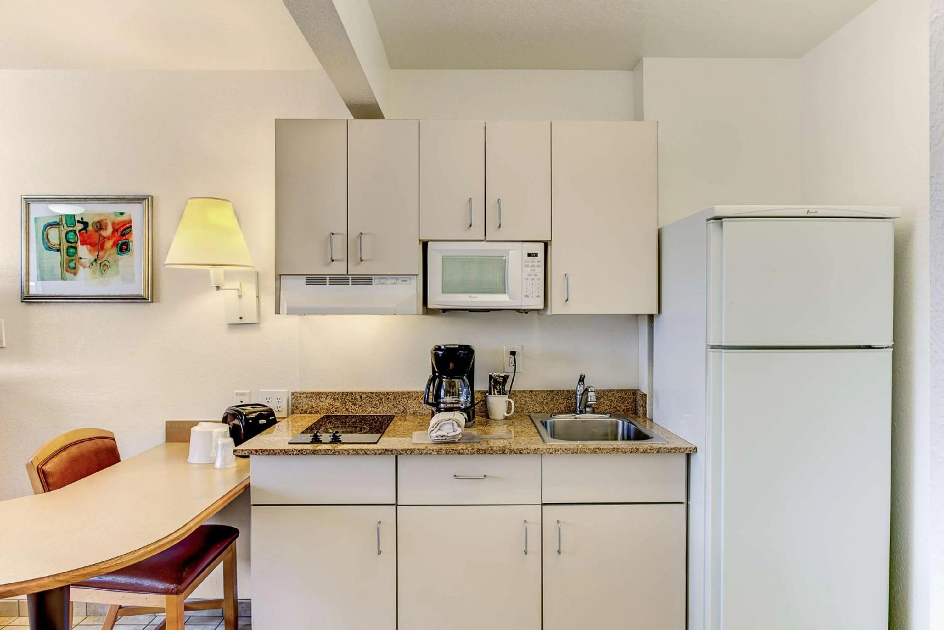 Kitchen or kitchenette in Studio 6-Kissimmee, FL - Orlando