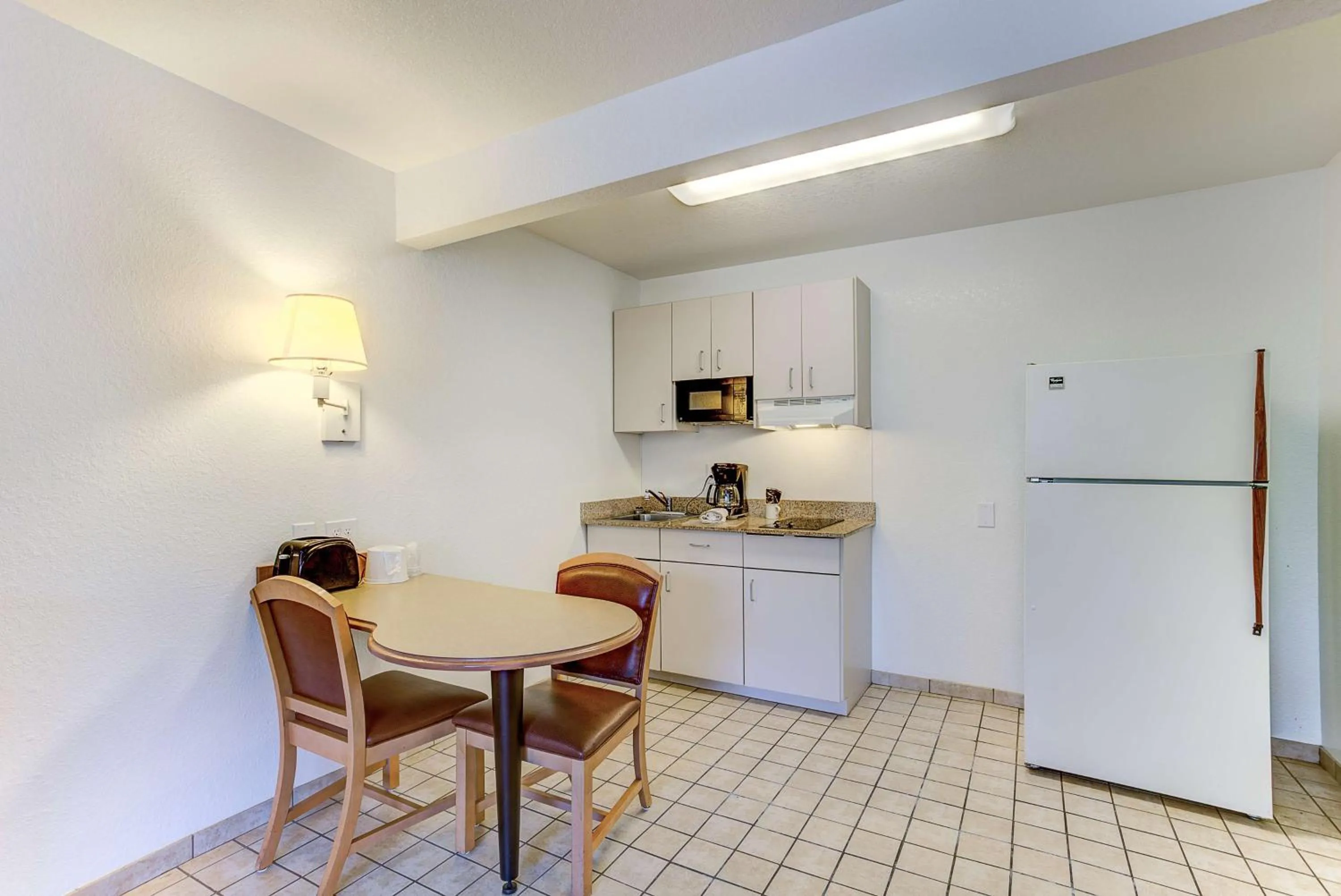 Kitchen or kitchenette in Studio 6-Kissimmee, FL - Orlando