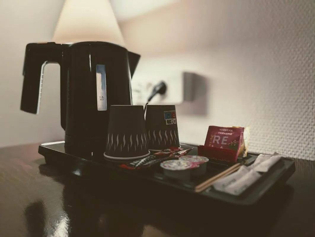Bedroom in Hôtel Du Centre Annemasse