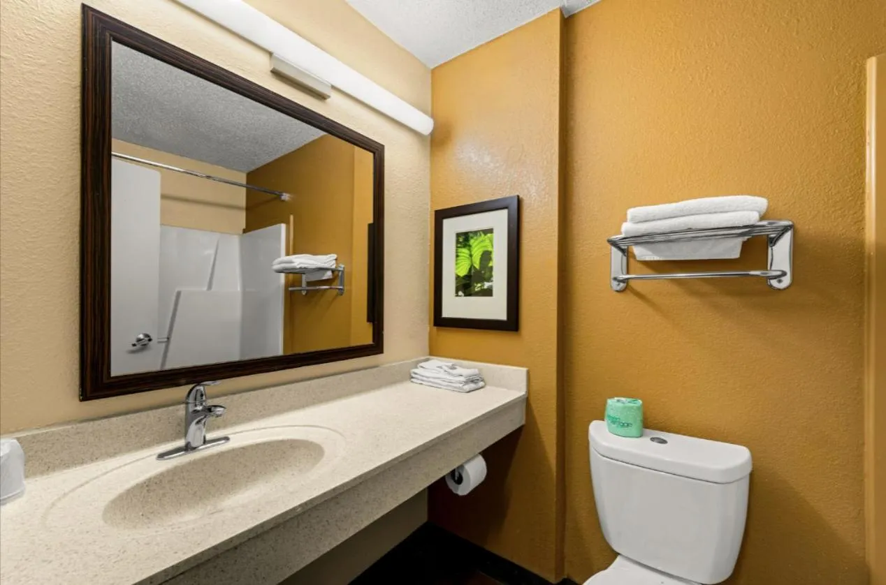 Toilet in Suburban Studios Winston-Salem near Hanes Mall