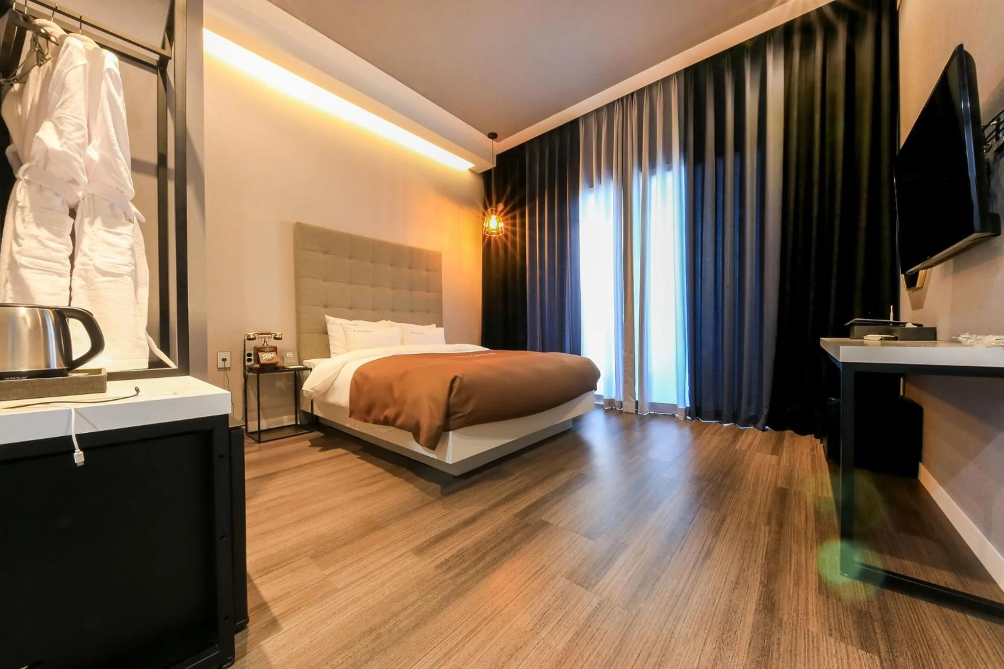 Bed in Merrymud Hotel