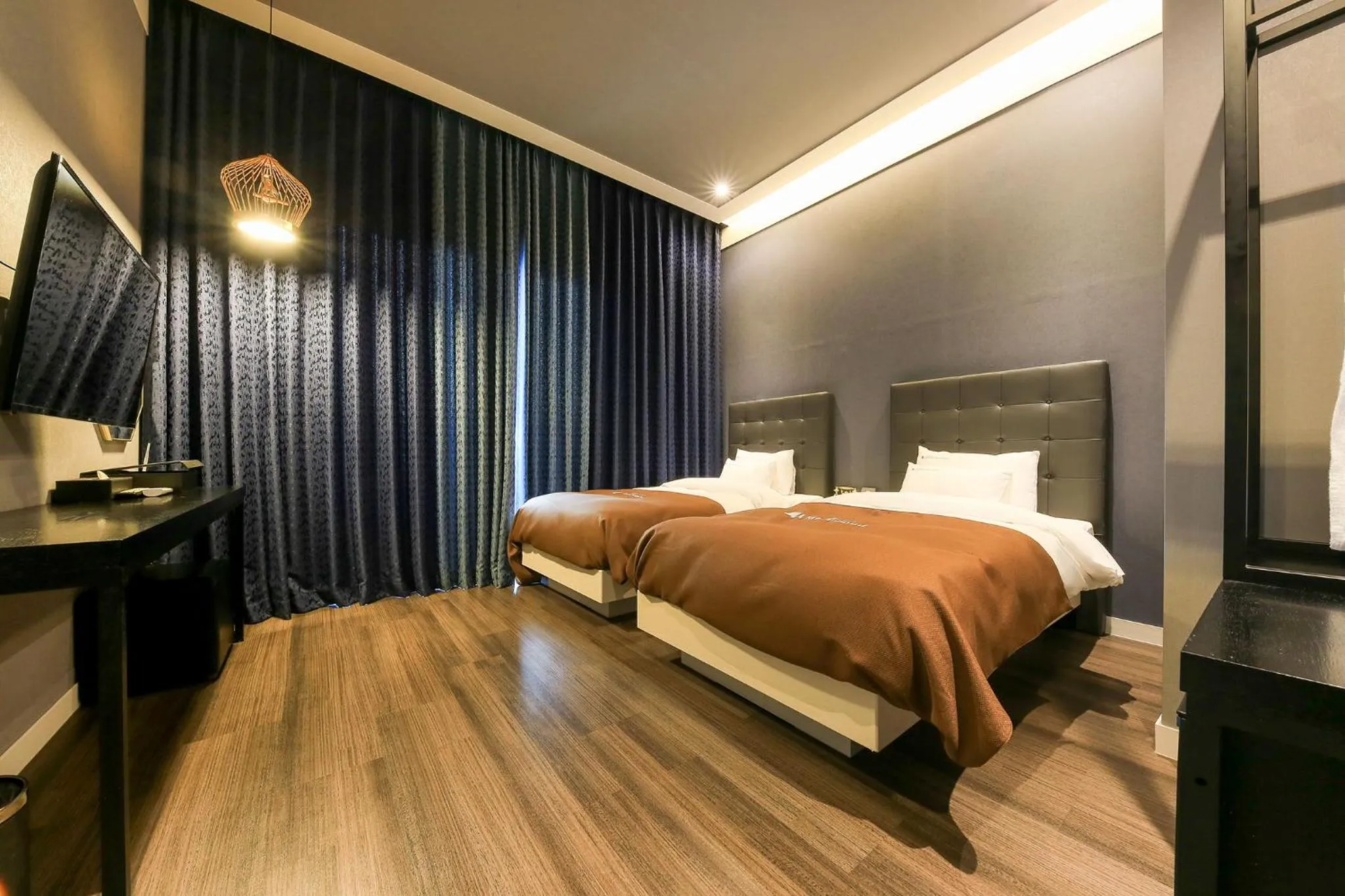 Bed in Merrymud Hotel