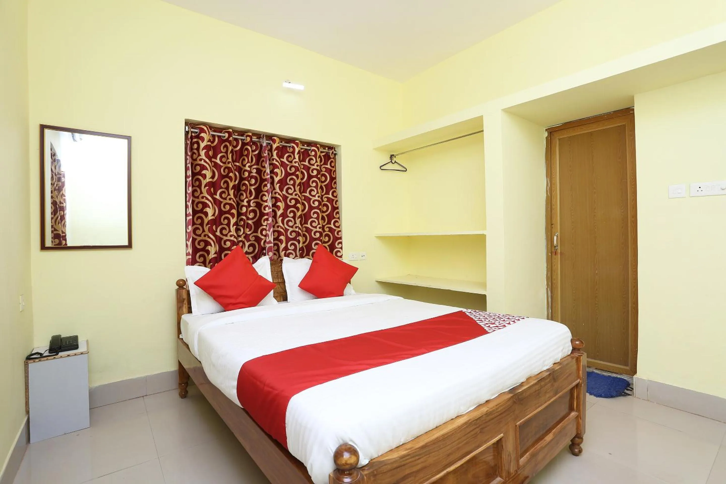 Bedroom in Hotel O Nandan Residency