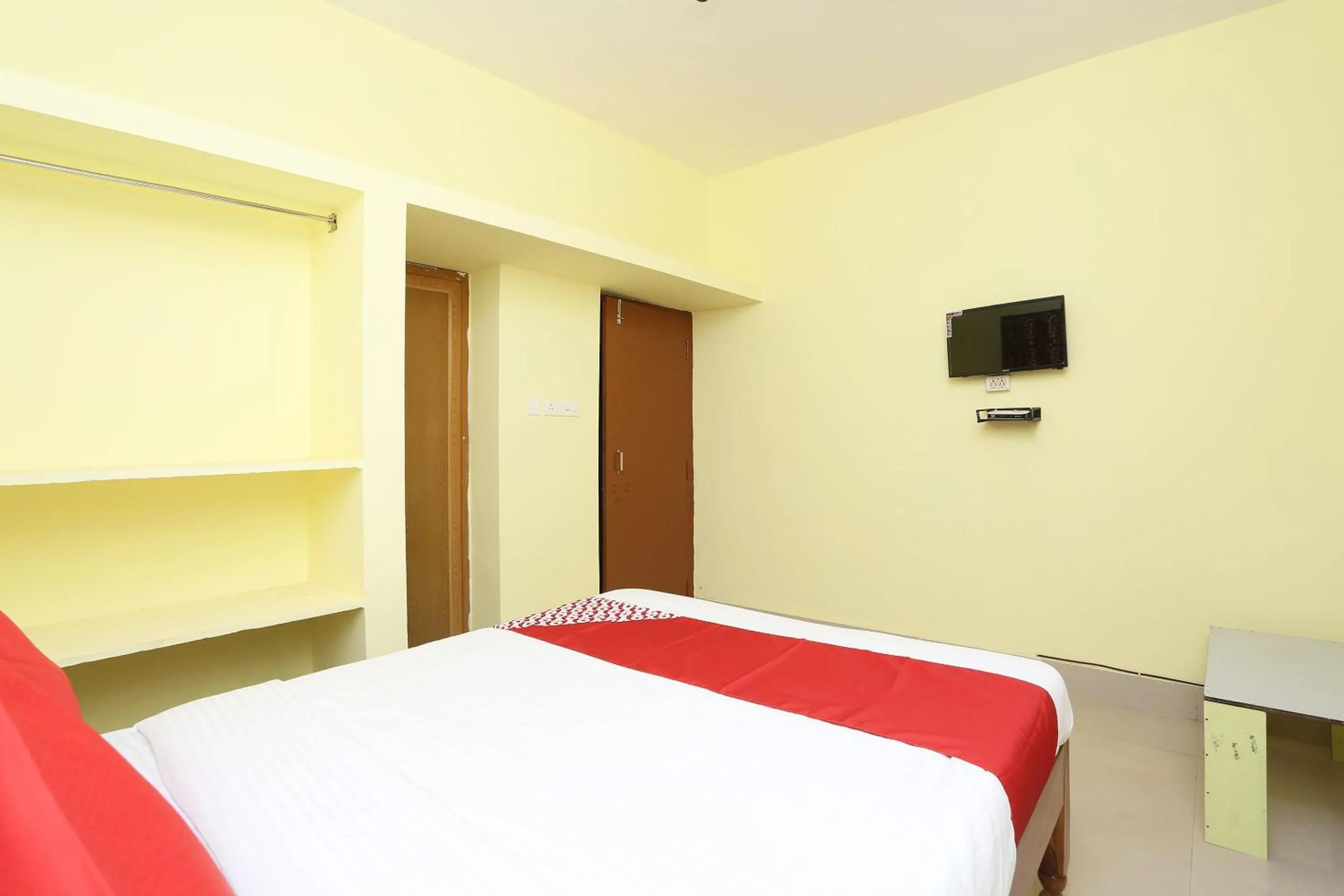 Bedroom in Hotel O Nandan Residency