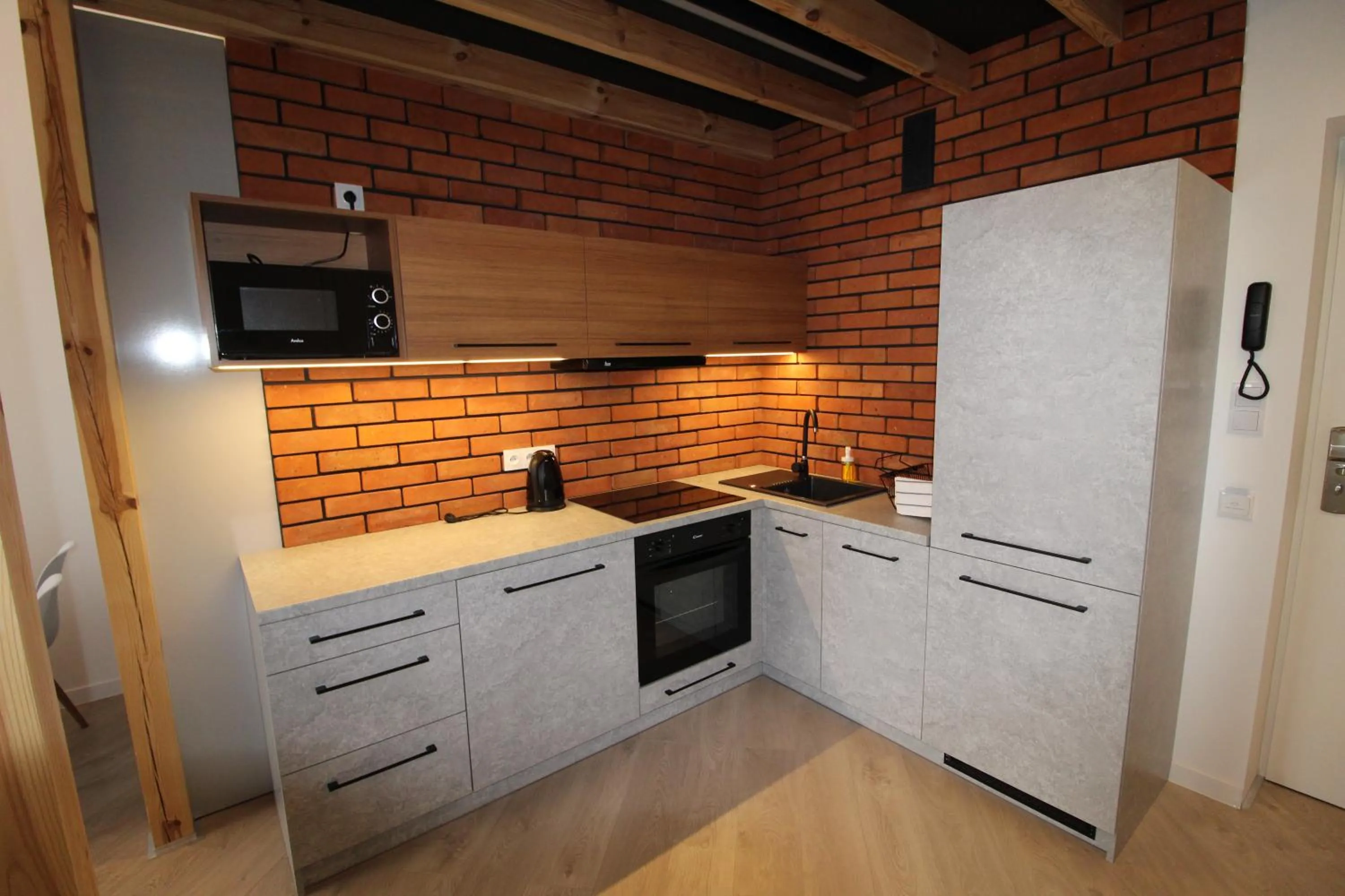 Kitchen or kitchenette in Apartamenty Nowa Kamienica Częstochowa Centrum Szymanowskiego 22A