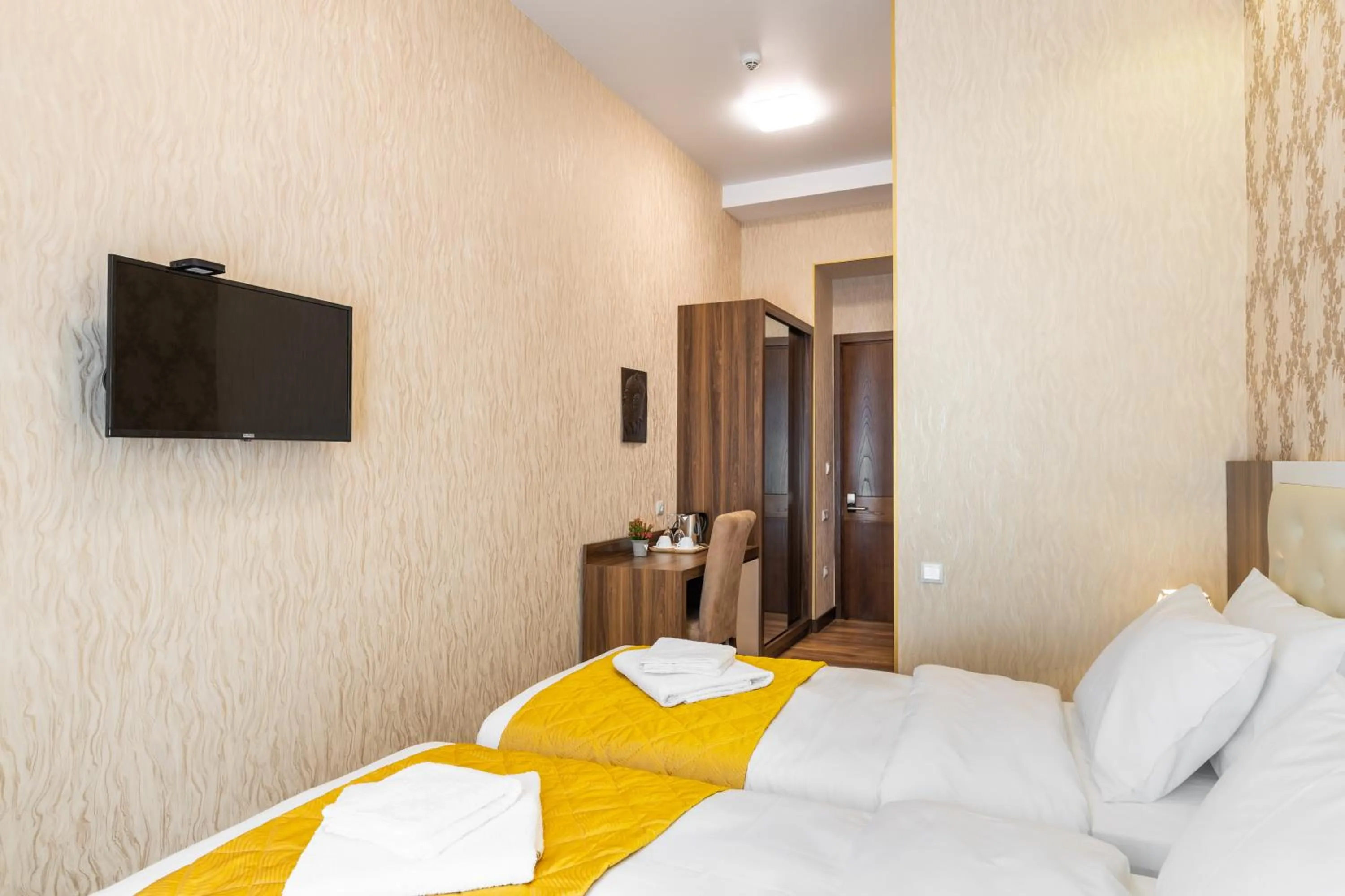 Bed in Ornament Hotel