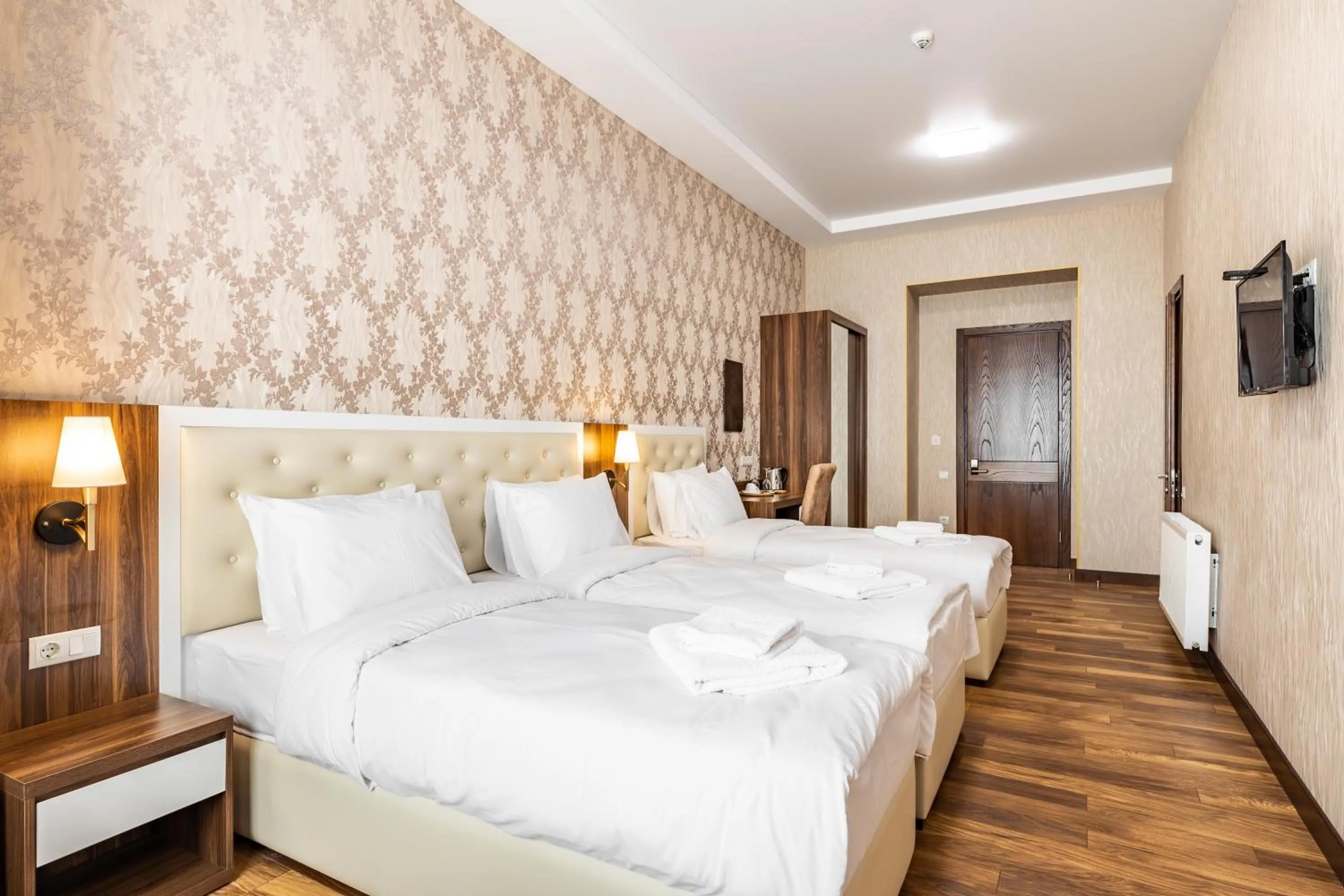 Bed in Ornament Hotel