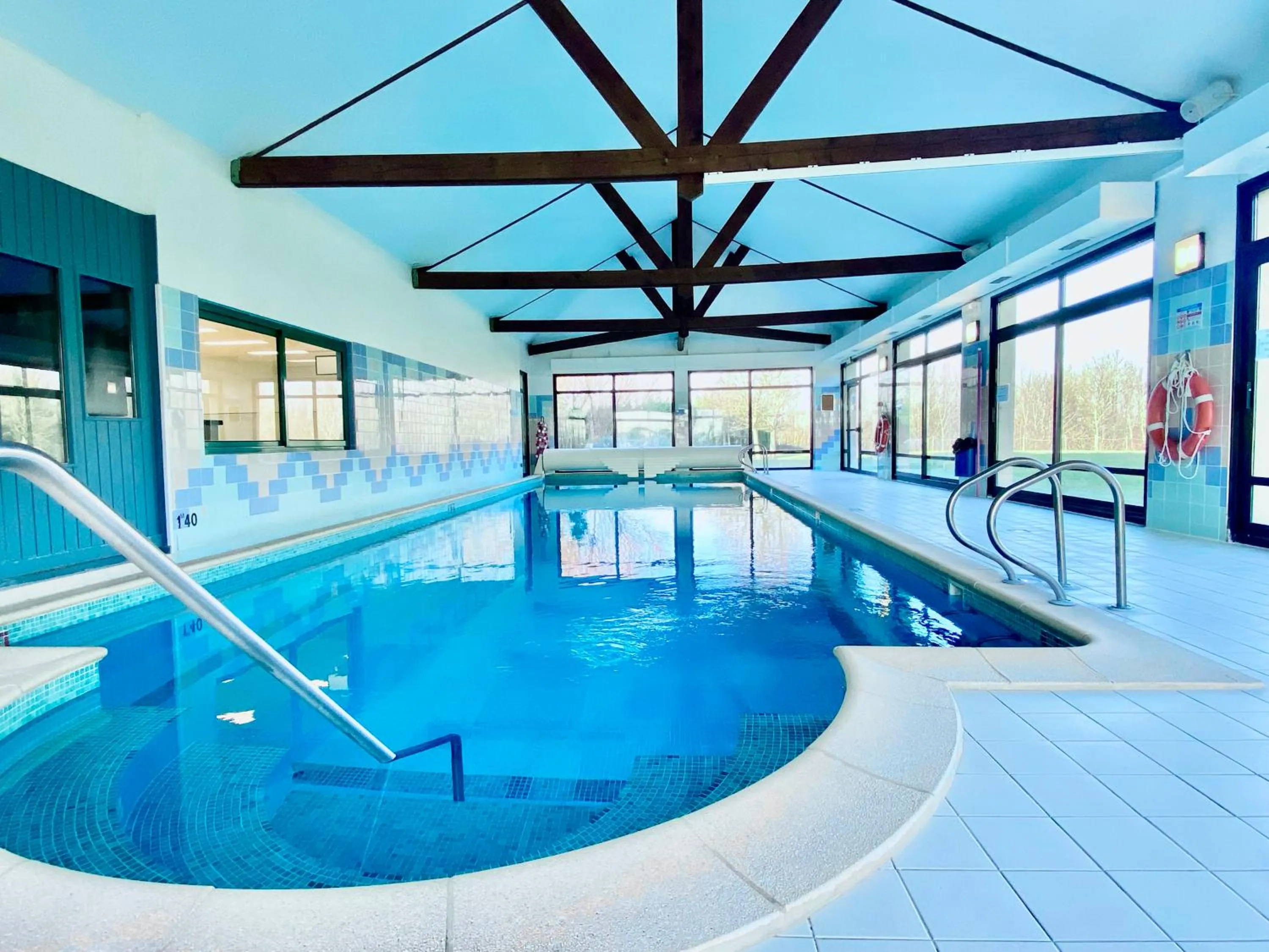 Swimming pool in Holiday Inn Calais Coquelles by IHG