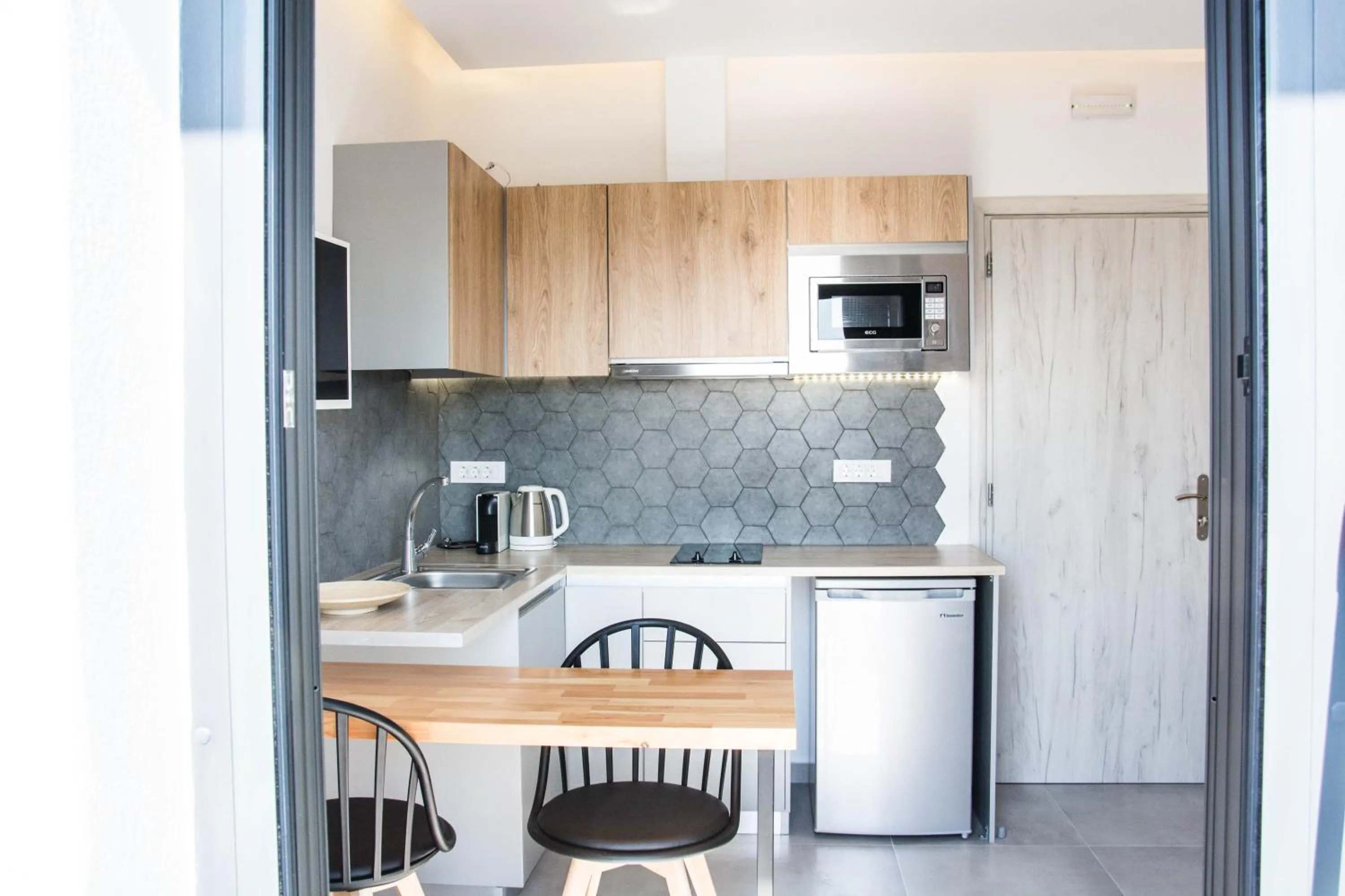 Kitchen or kitchenette in Dragonfly Villas