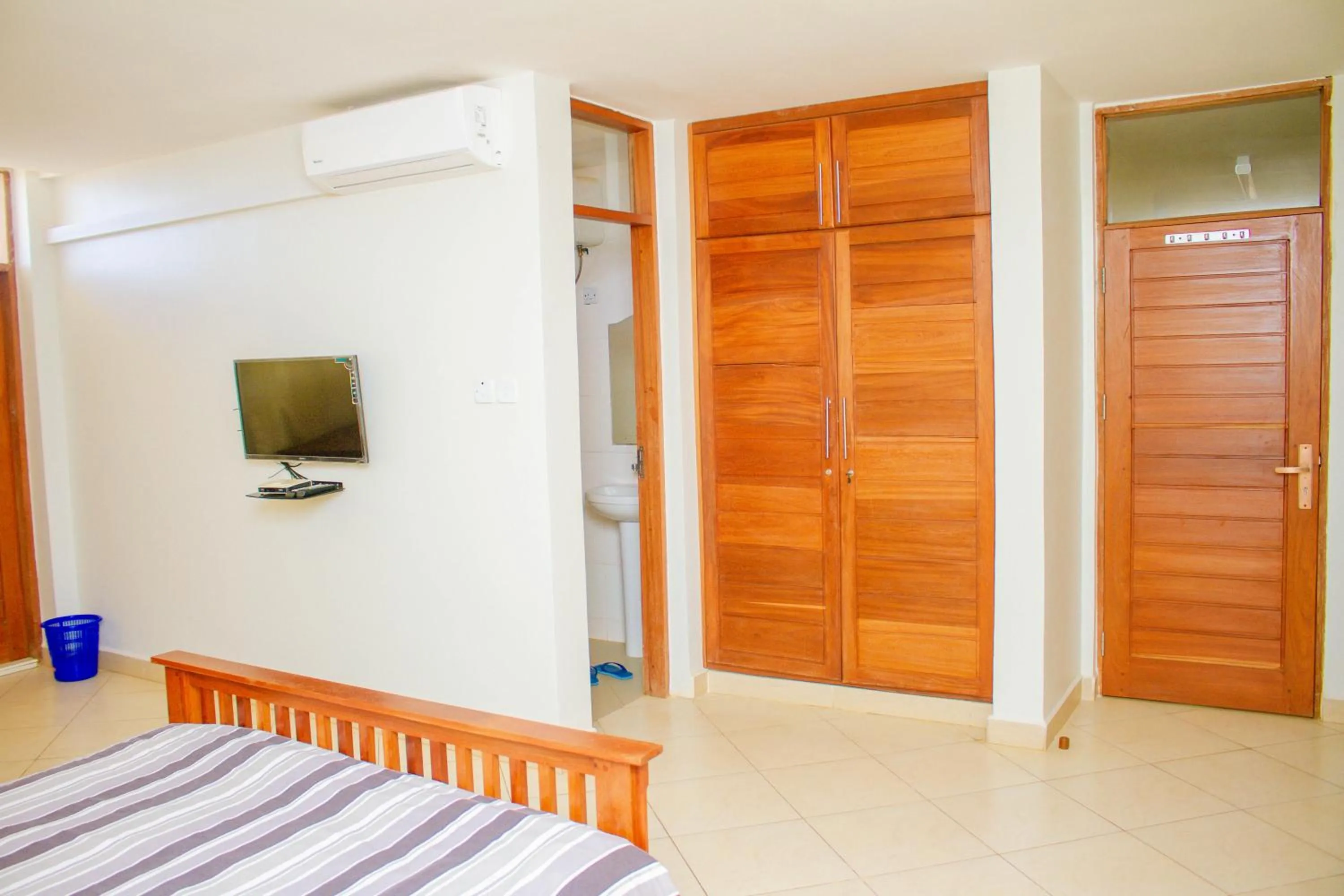 Bedroom in Ambiere House