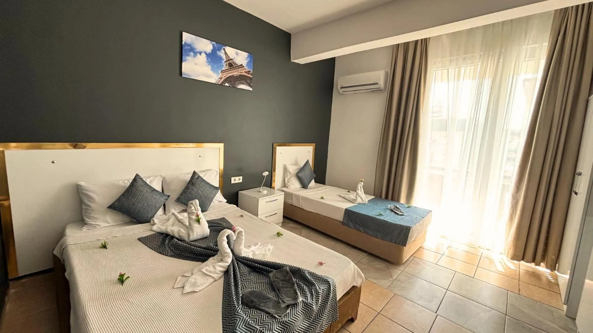 TV and multimedia, Bed in MOONBOW BEACH HOTEL