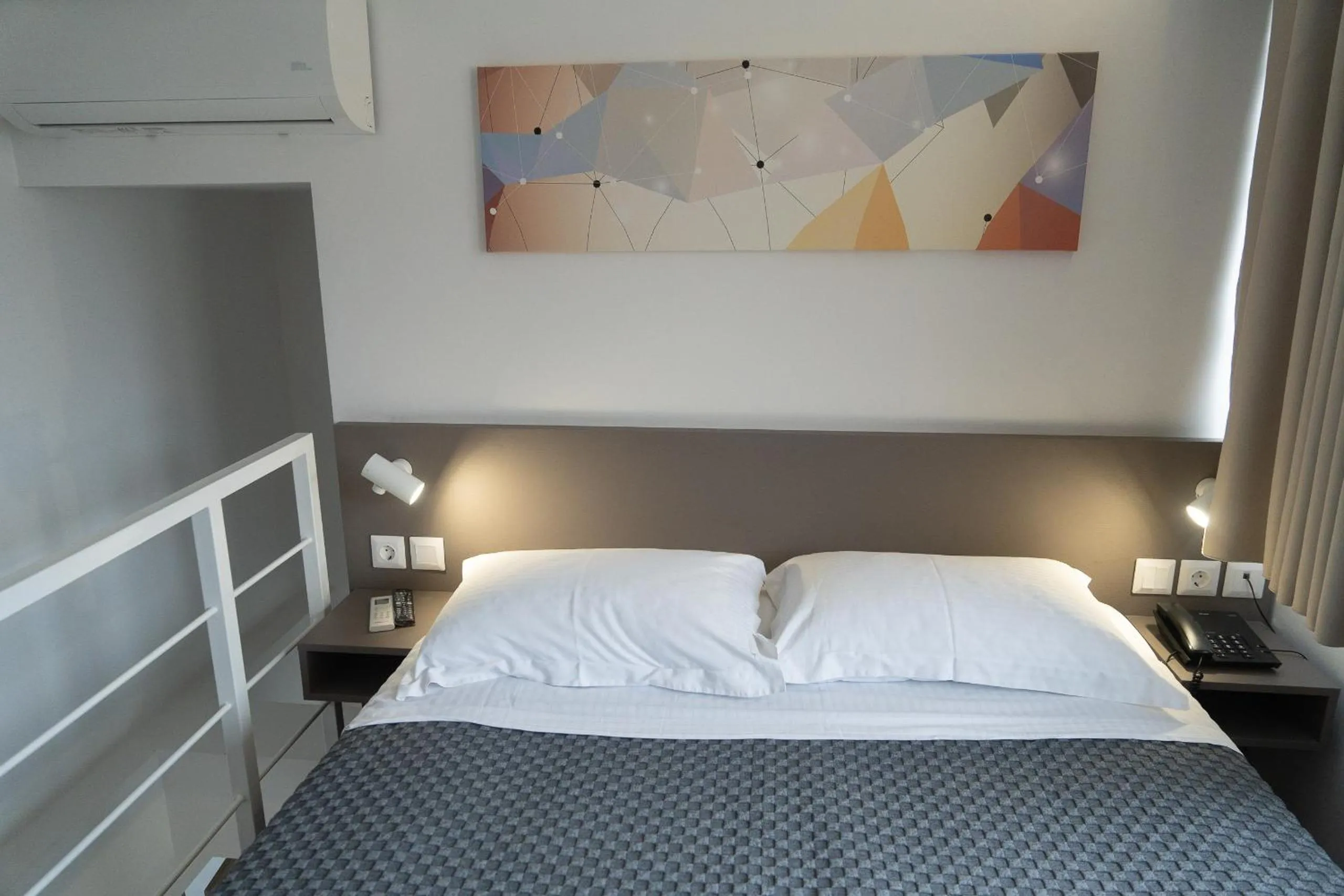 Bed in Olympos Suites Apartments