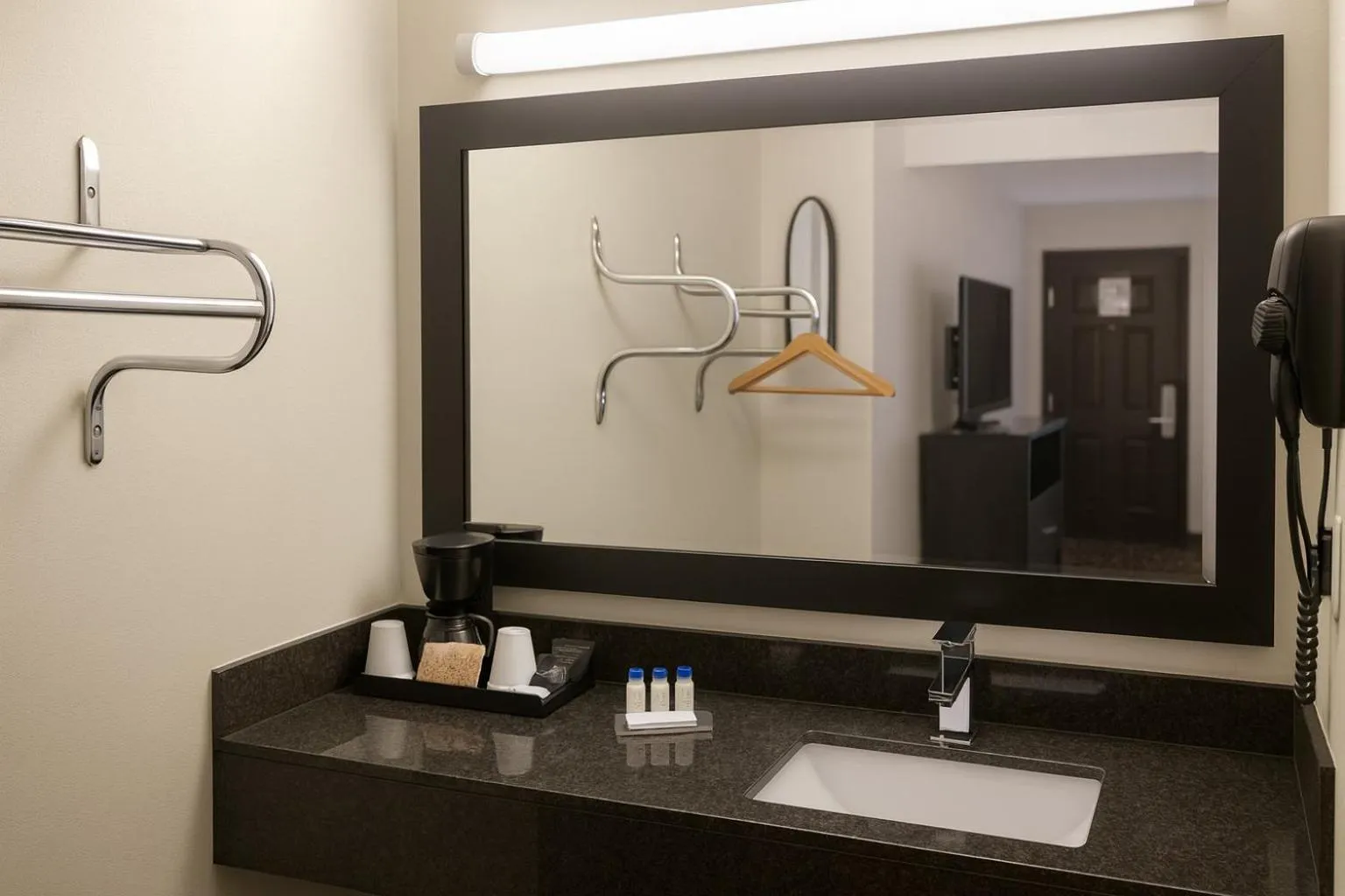 Bathroom in Boarders Inn & Suites by Cobblestone Hotels - Ashland City