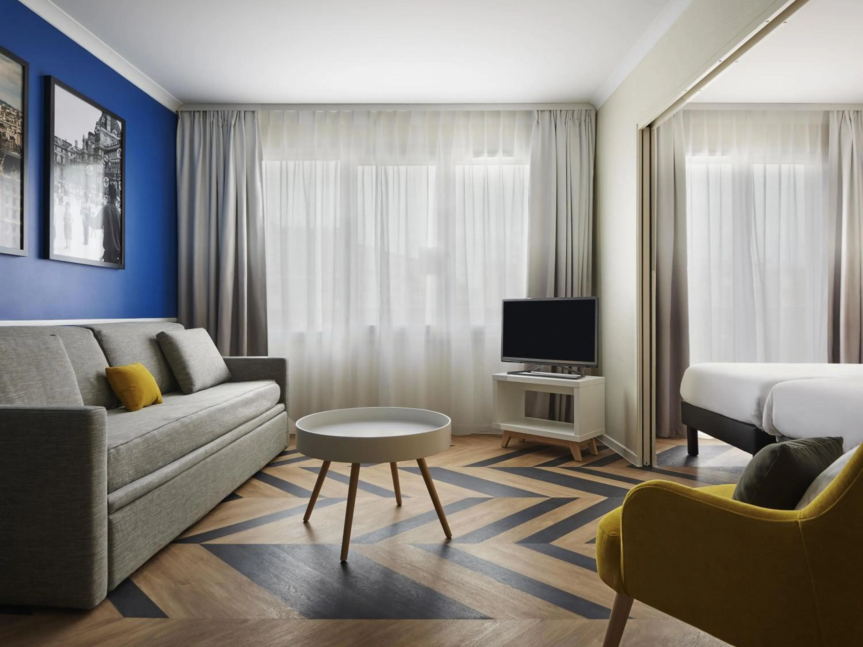 Bedroom in Aparthotel Adagio Porte de Versailles