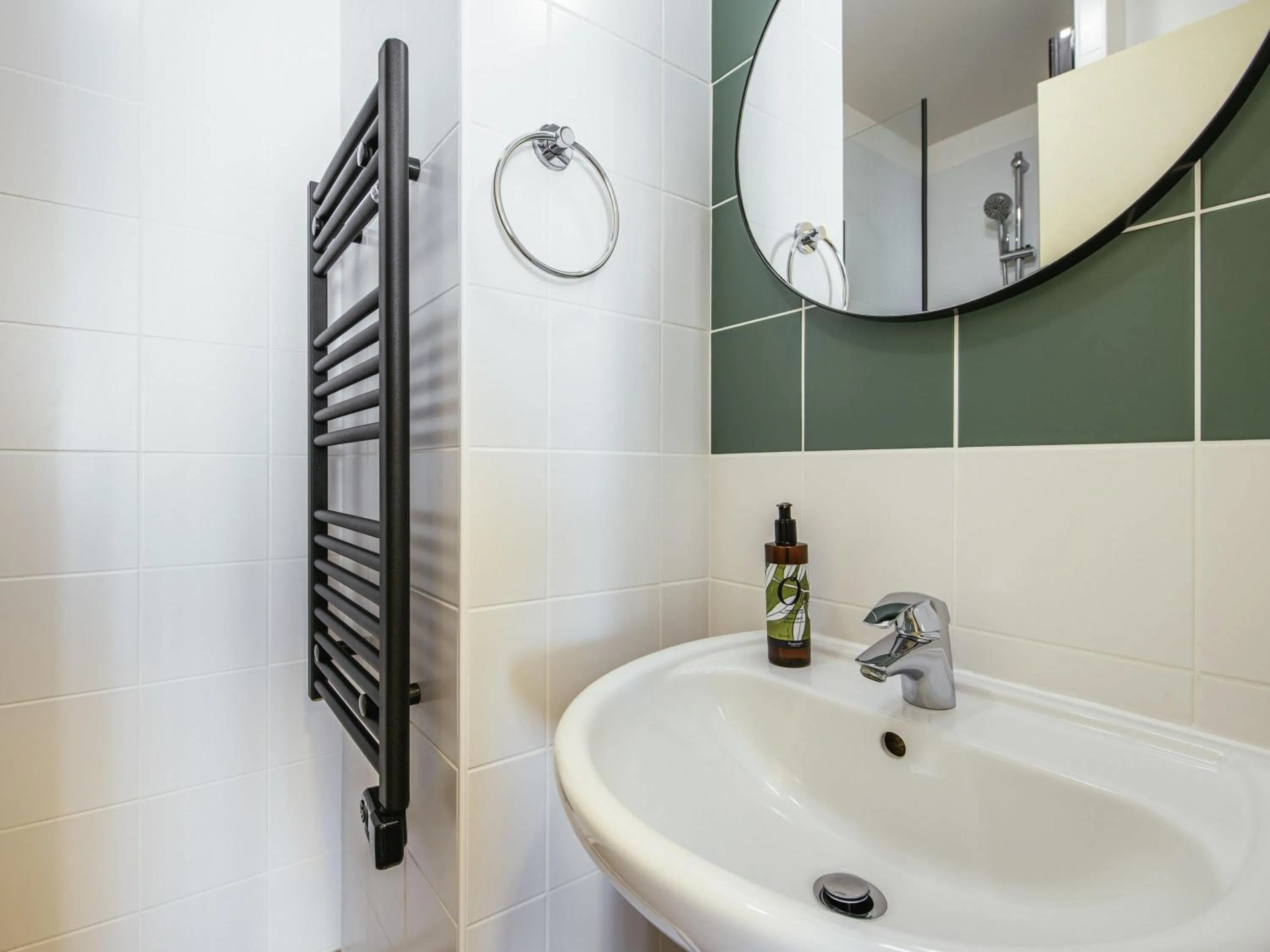 Bedroom in Aparthotel Adagio Paris Buttes Chaumont