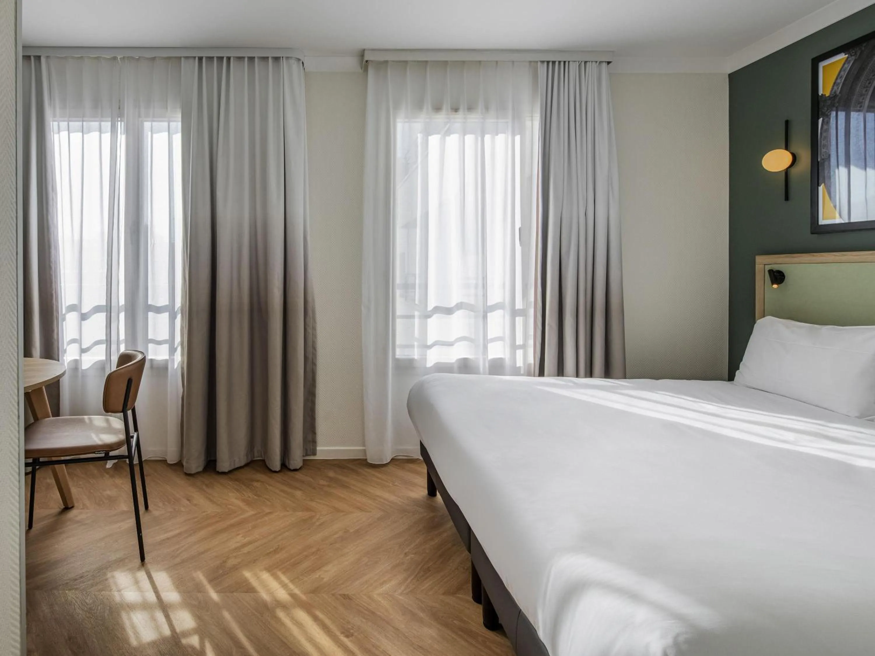 Bedroom, Bed in Aparthotel Adagio Paris Buttes Chaumont