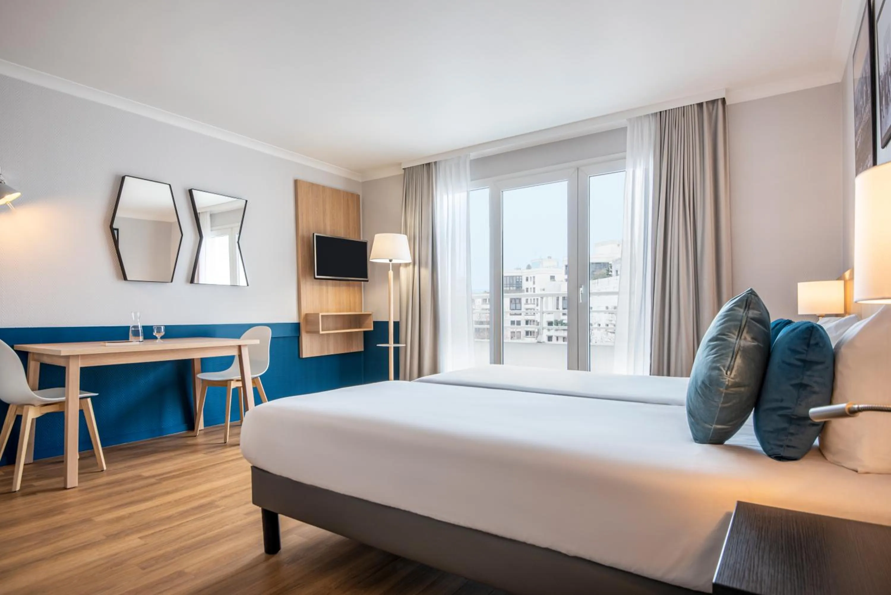 Bedroom, Bed in Aparthotel Adagio La Défense Kléber