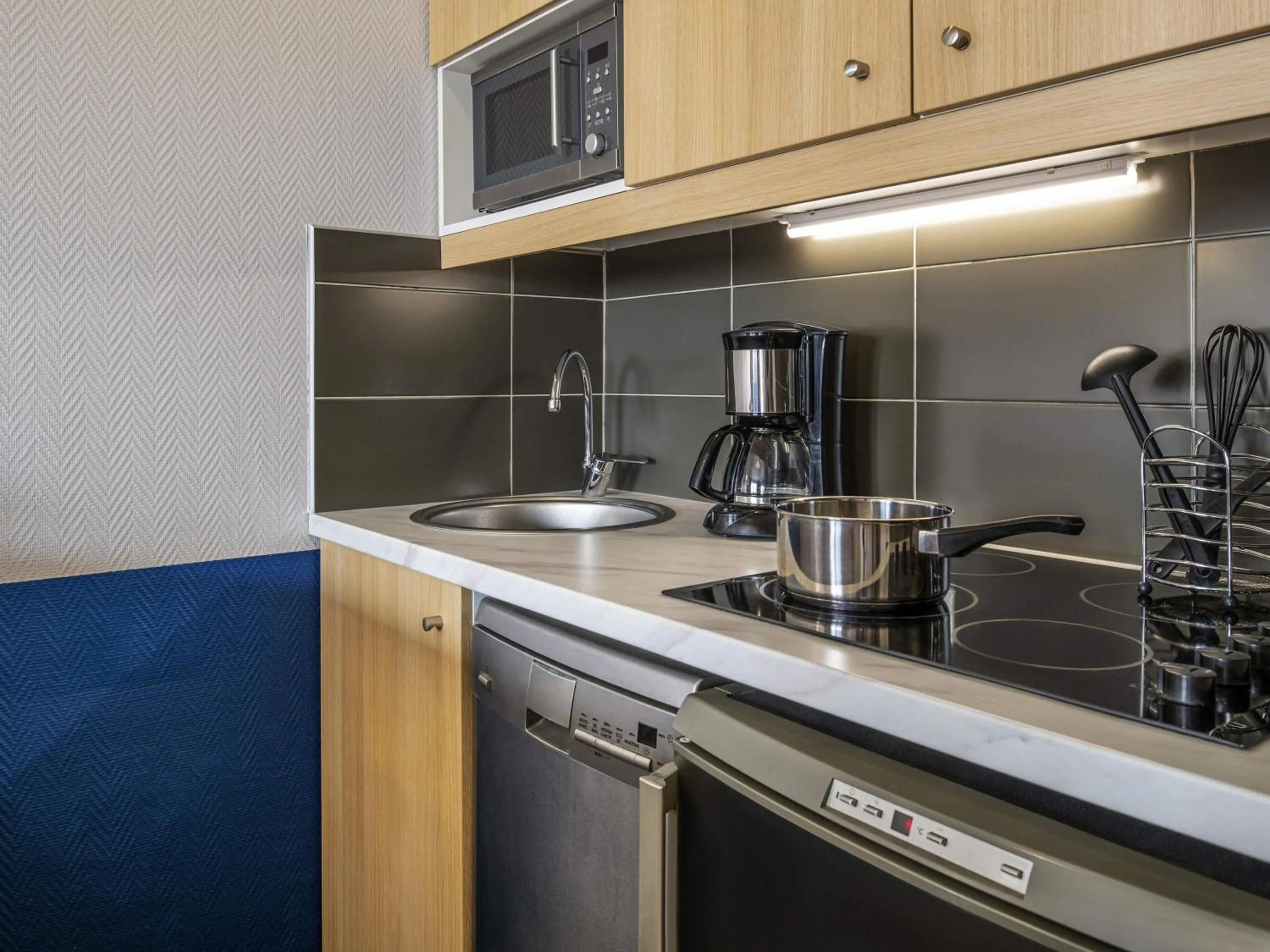 Bedroom in Aparthotel Adagio La Défense Kléber