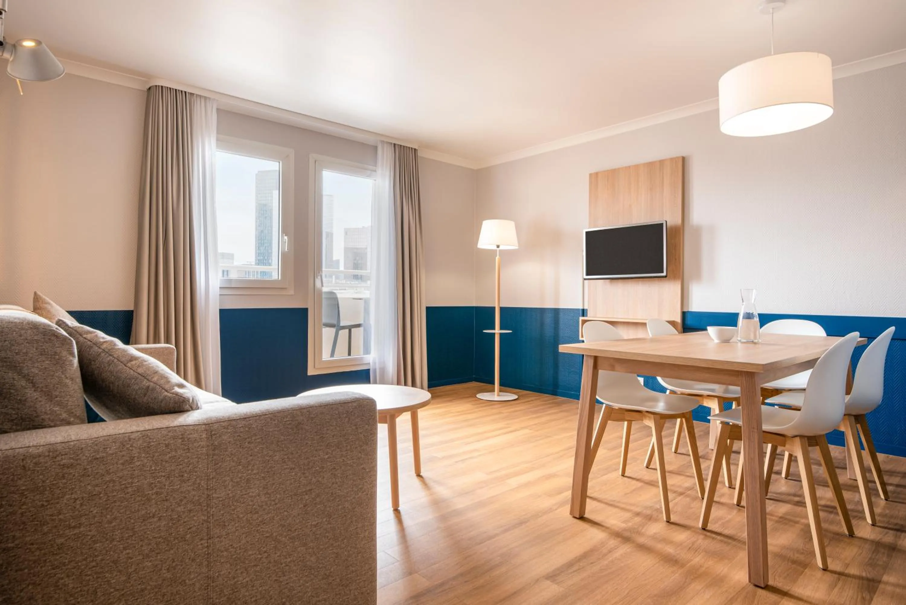 Living room in Aparthotel Adagio La Défense Kléber