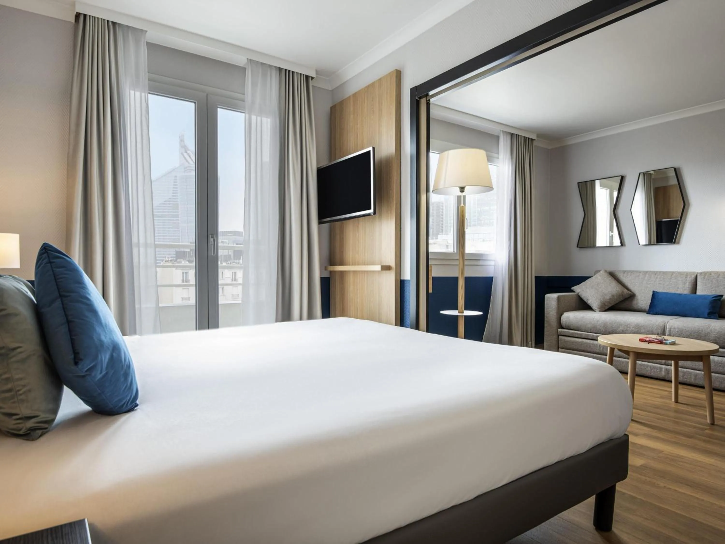 Bedroom, Bed in Aparthotel Adagio La Défense Kléber