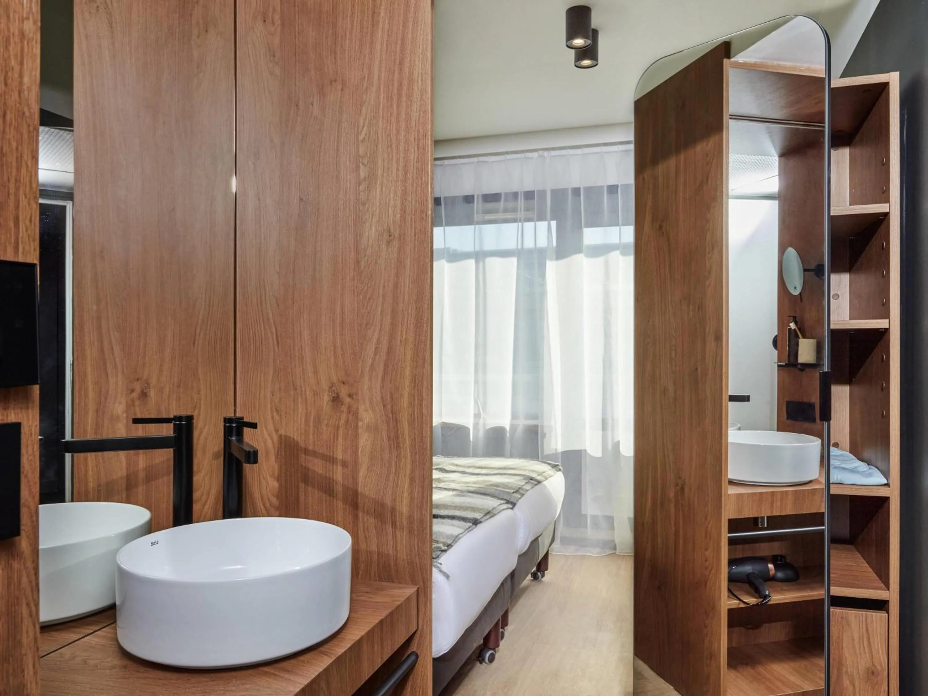 Bedroom in Aparthotel Adagio Paris Bercy Village