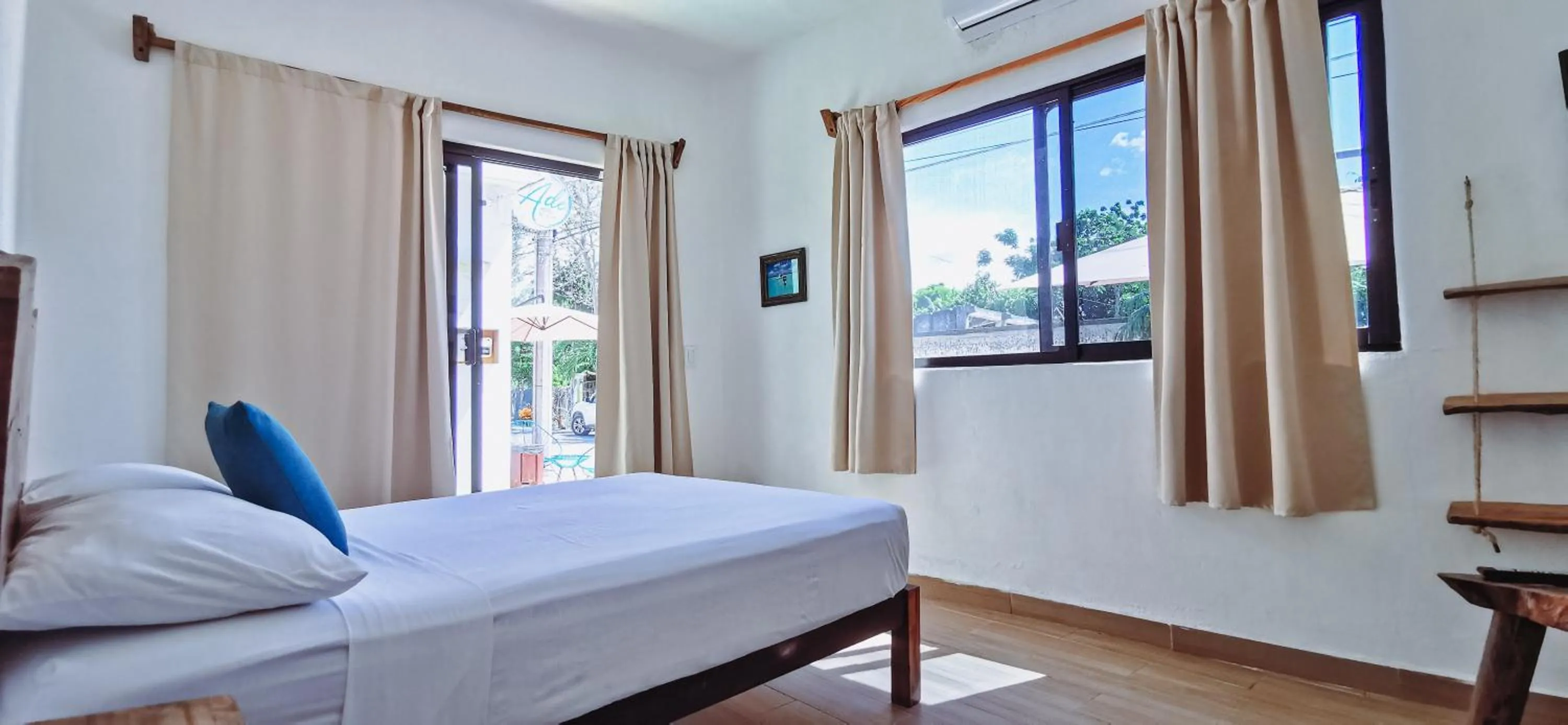 Bed in Ade Hotel Bacalar