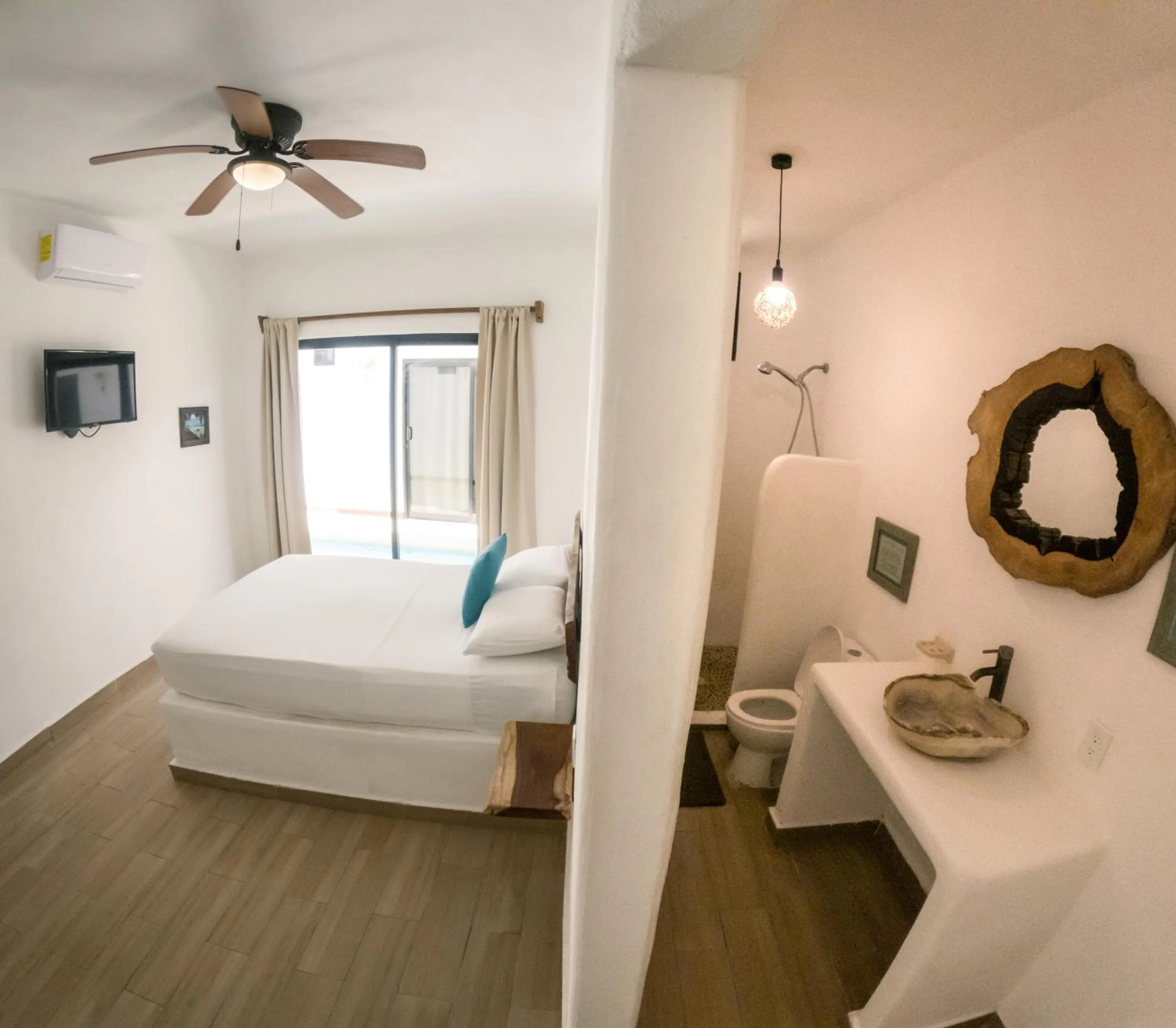 Bed in Ade Hotel Bacalar